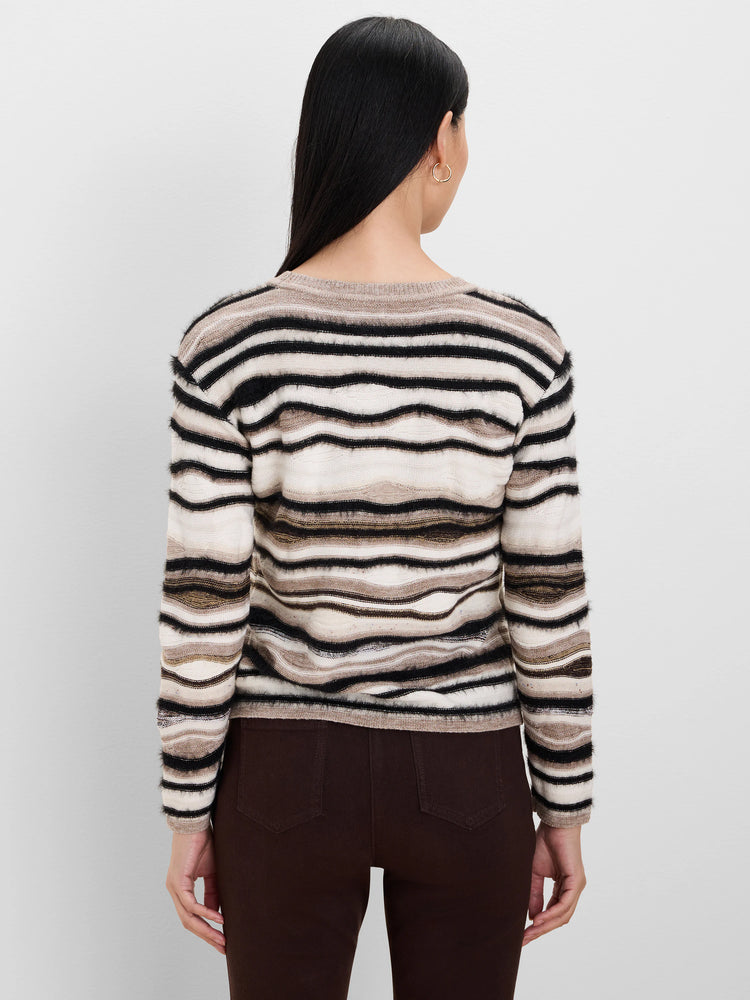 Fuzzy black, cream, and brown striped sweater with varied stripe widths.