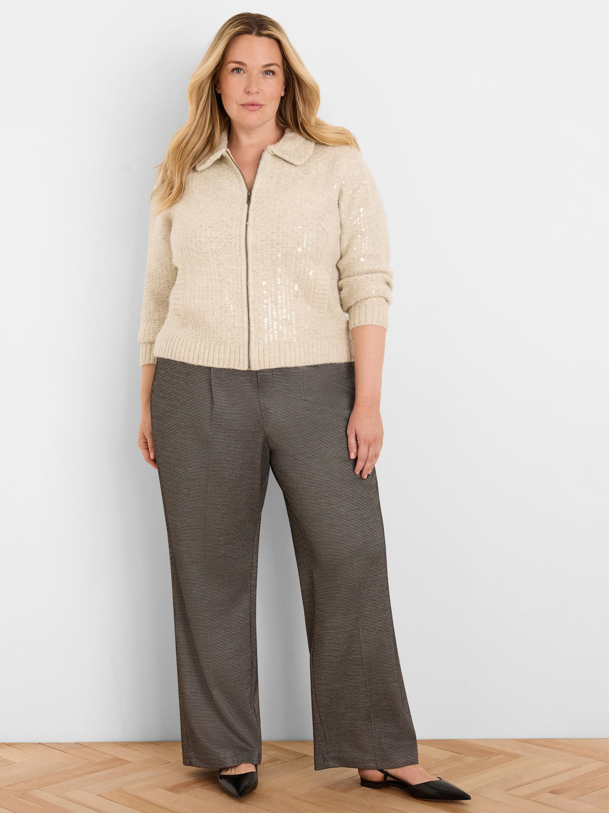 Wide-leg trousers in dark charcoal tweed with subtle metallic flecks.