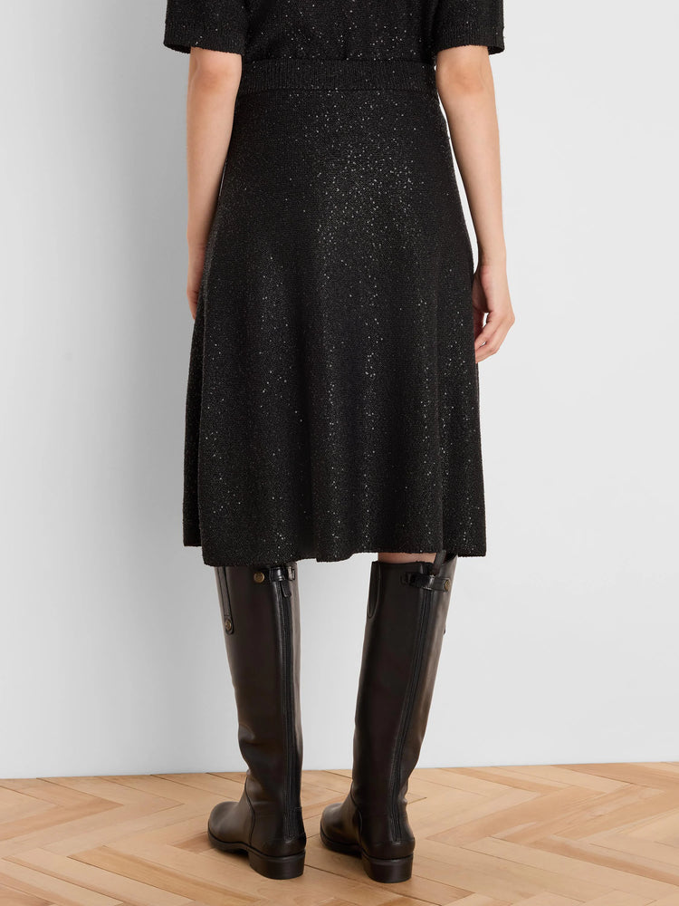 Black A-line sequin knit skirt, mid-calf length, with a ribbed waist, sparkling all over.