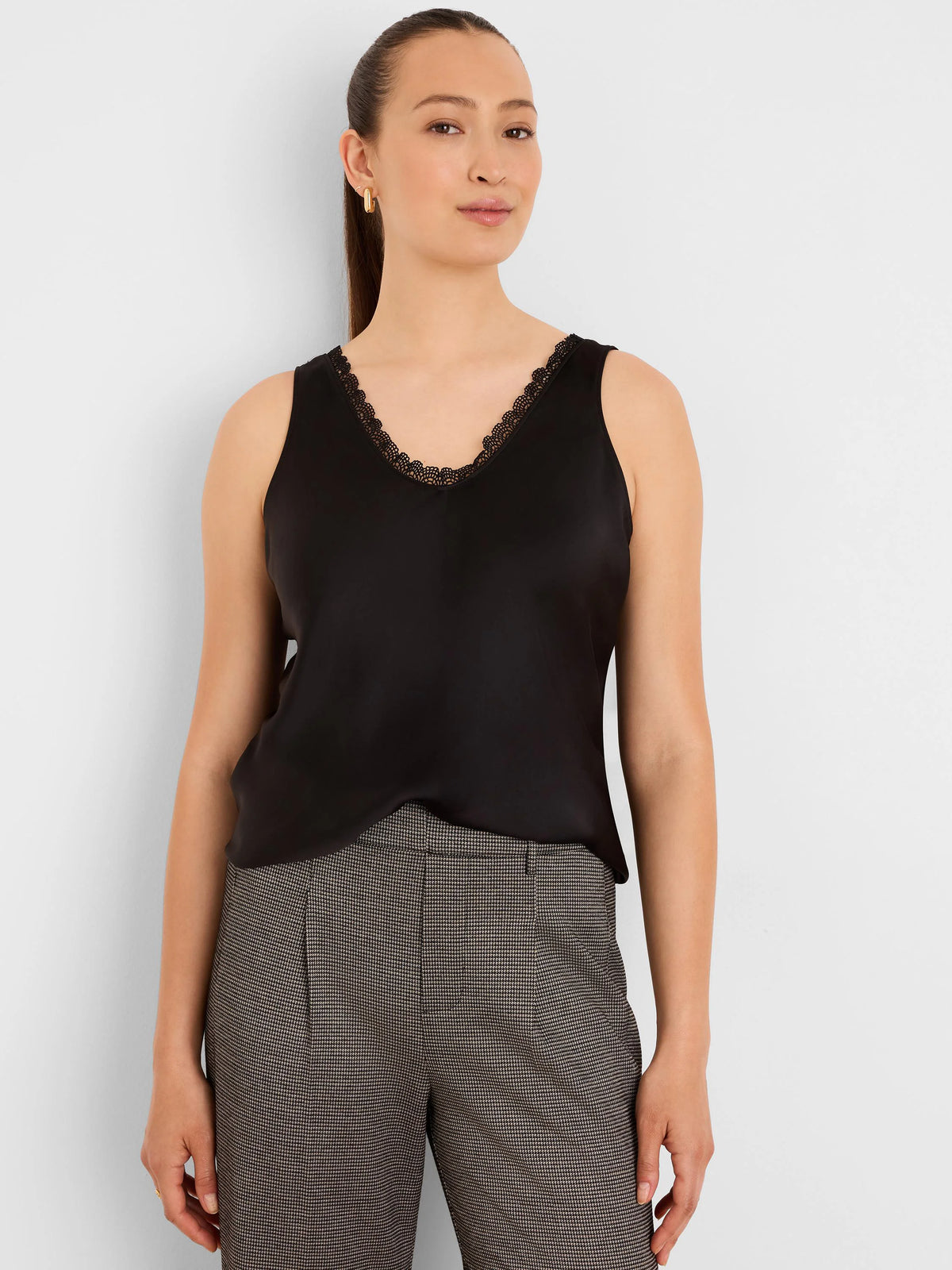 Black glossy sleeveless tank with V-neck and black lace trim.