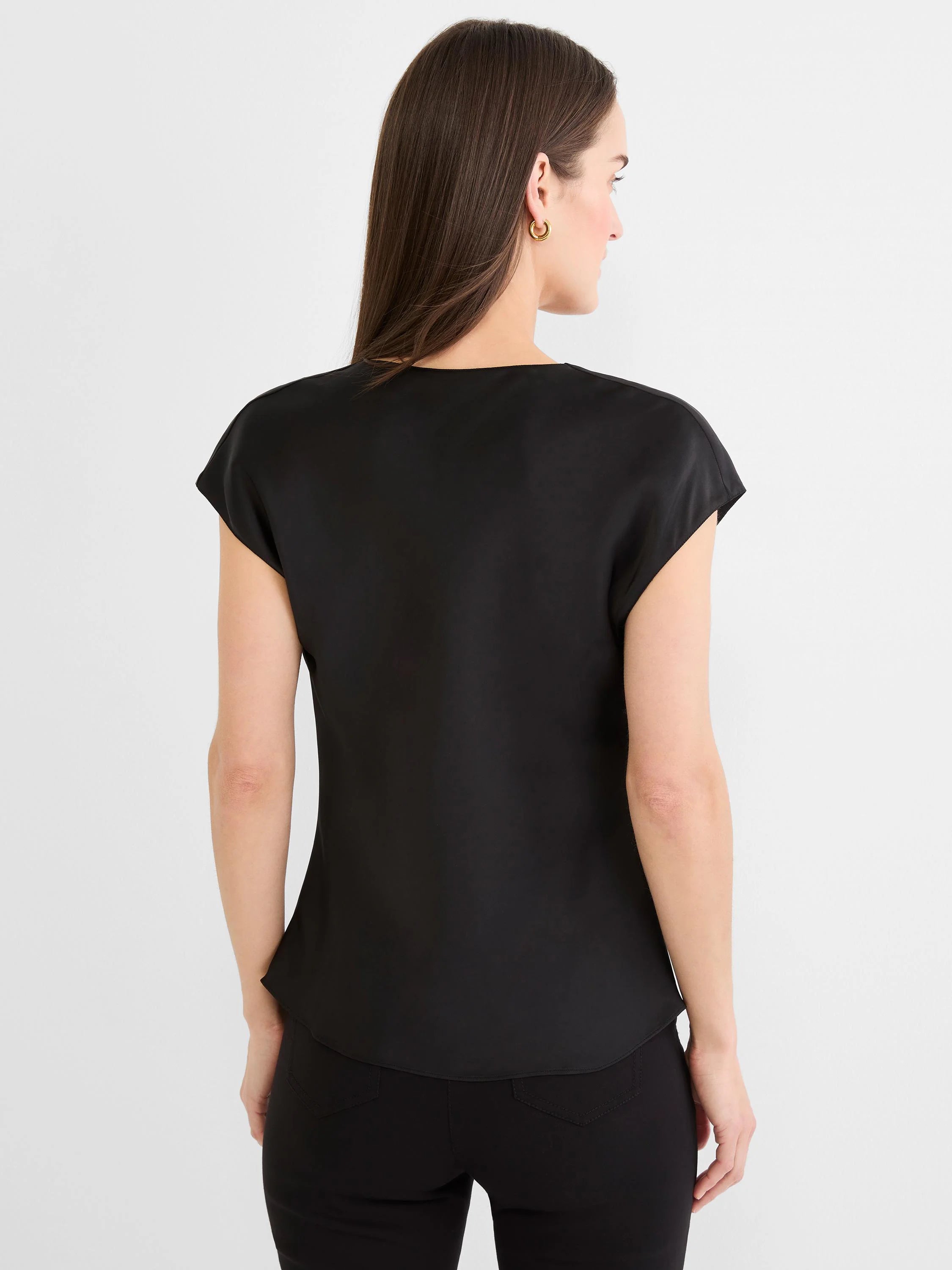 Black glossy tee, back view. Features a wide, shallow neckline and short cap sleeves.