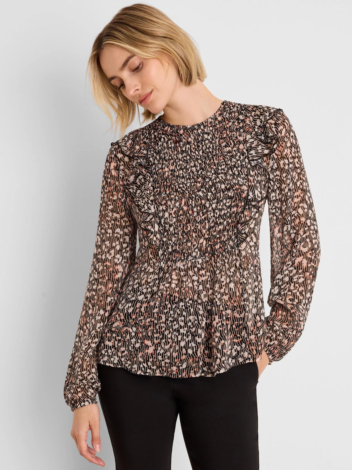 Black, beige & rust leopard print Georgette shirt with smocked high neck, ruffles, and elastic cuffs.