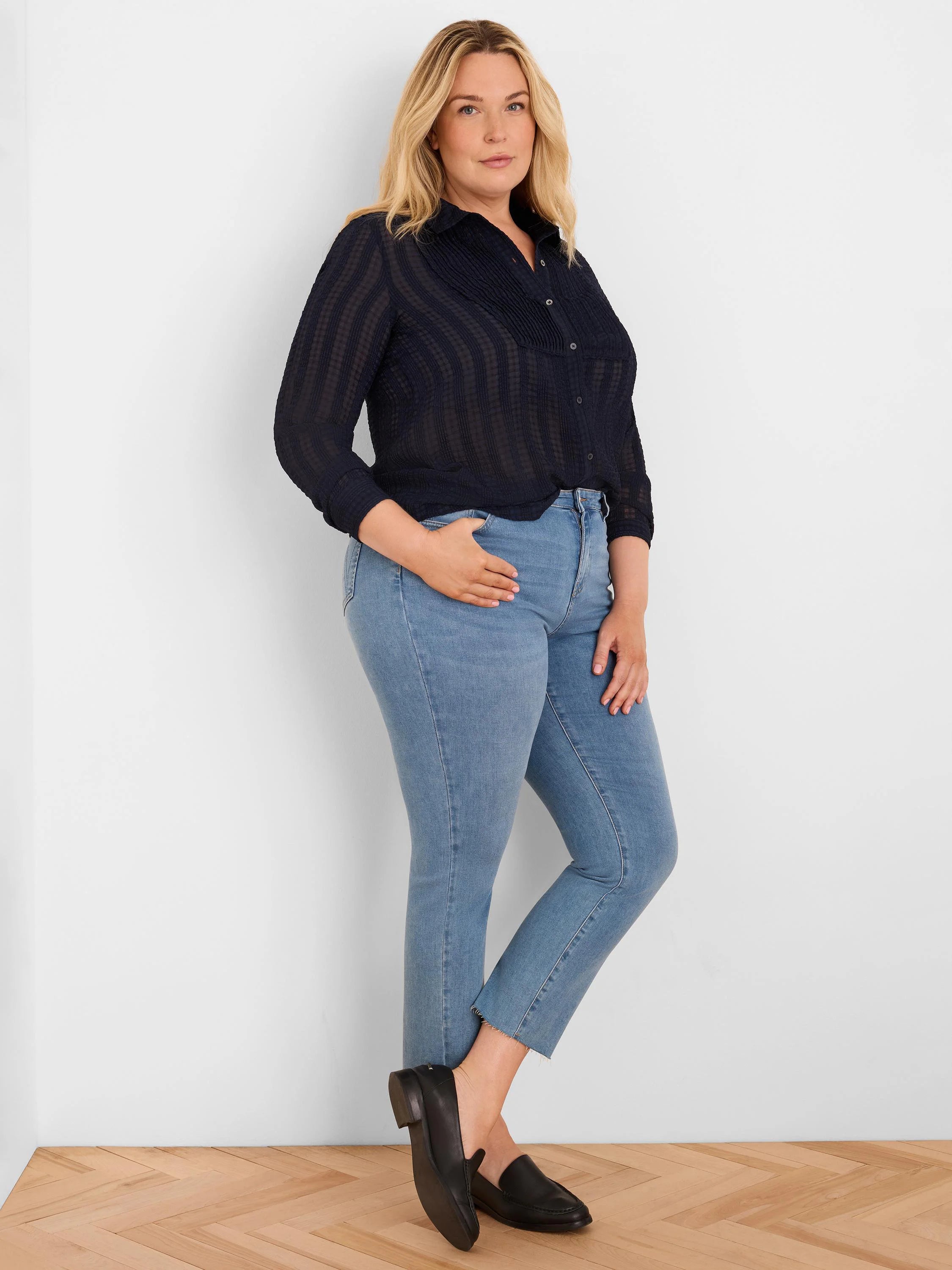Deep blue sheer chiffon jacquard shirt with a pleated tuxedo bib.