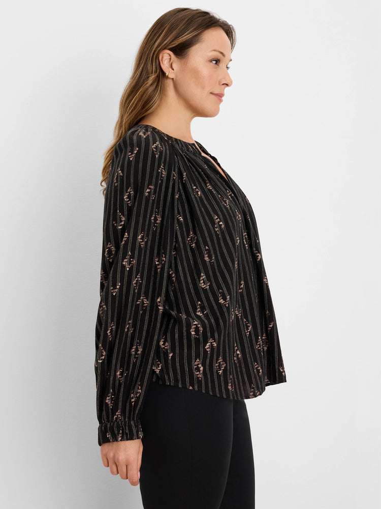 Black shirt with gold lurex vertical stripes & diamond pattern, V-neck, gathered cuffs.