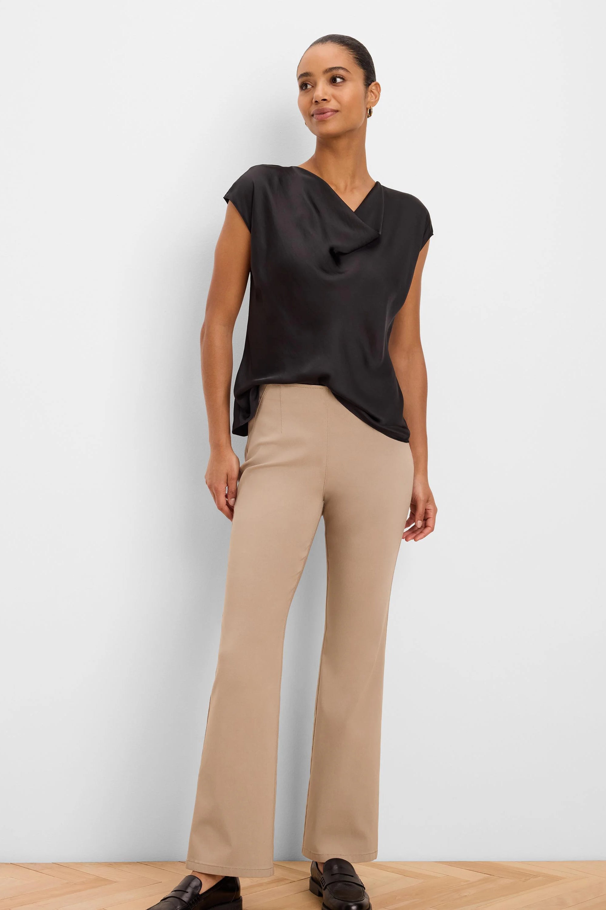 Tan, full-length, boot-cut Wonderstretch pants on a model.