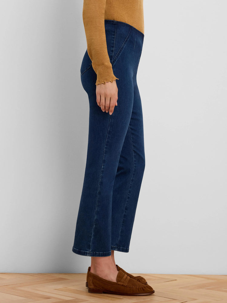 Dark blue boot-cut jeans with a high waist and diagonal seam details on the front.