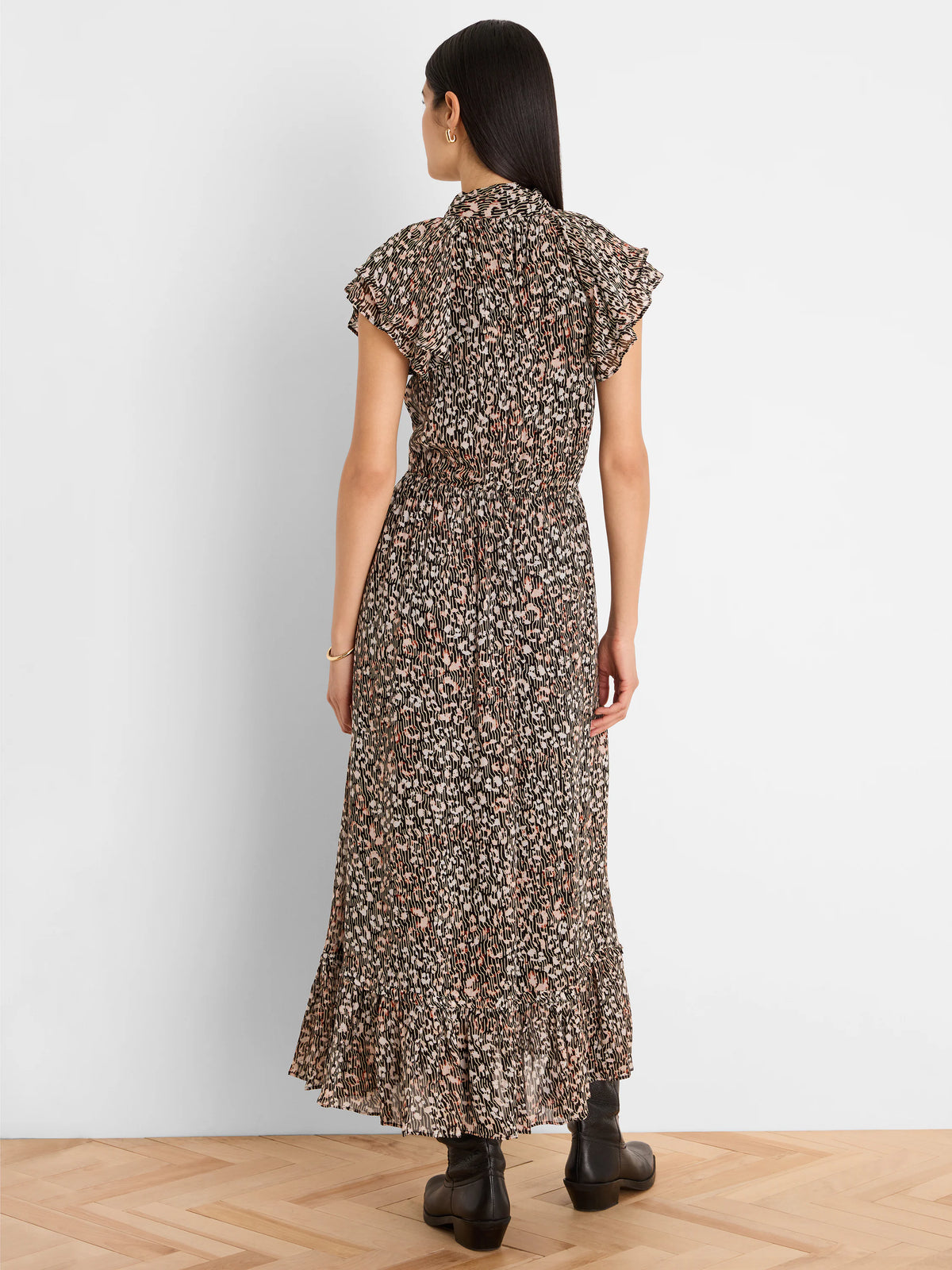 Black georgette maxi dress, cream/pink abstract animal print. Ruffled collar, cap sleeves, elastic waist.