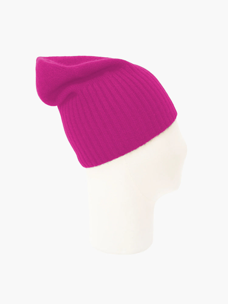 Pink cashmere beanie. Ribbed texture. Side view.
