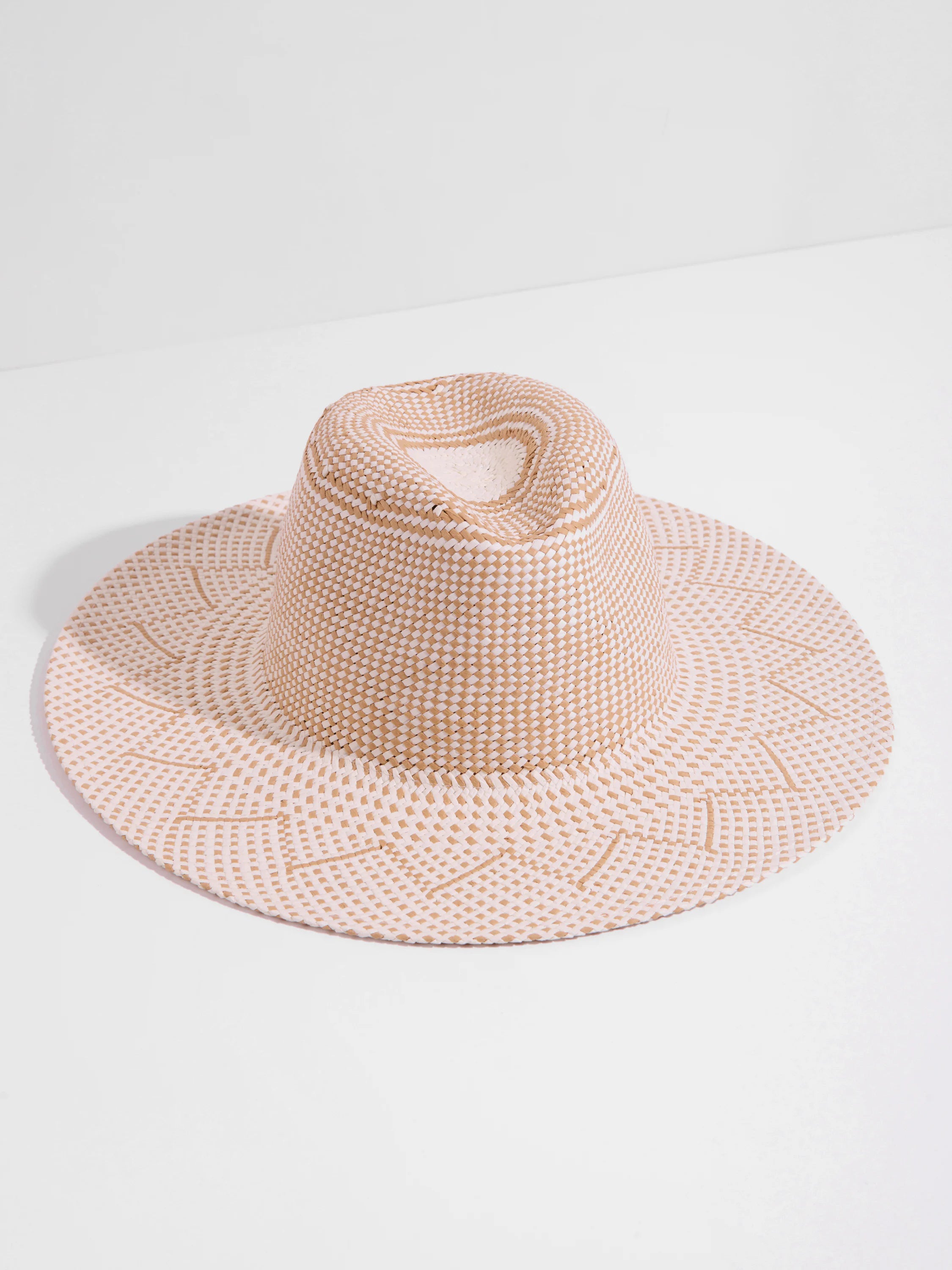 Beige and white woven fedora. The weave creates a geometric pattern.