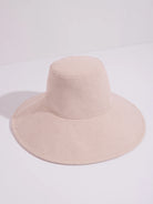 Beige sunhat with a wide brim and short crown.  Simple design, solid color.