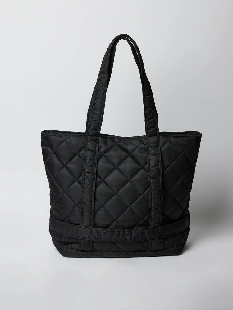 Black quilted tote bag with two shoulder straps. Diamond quilting pattern.