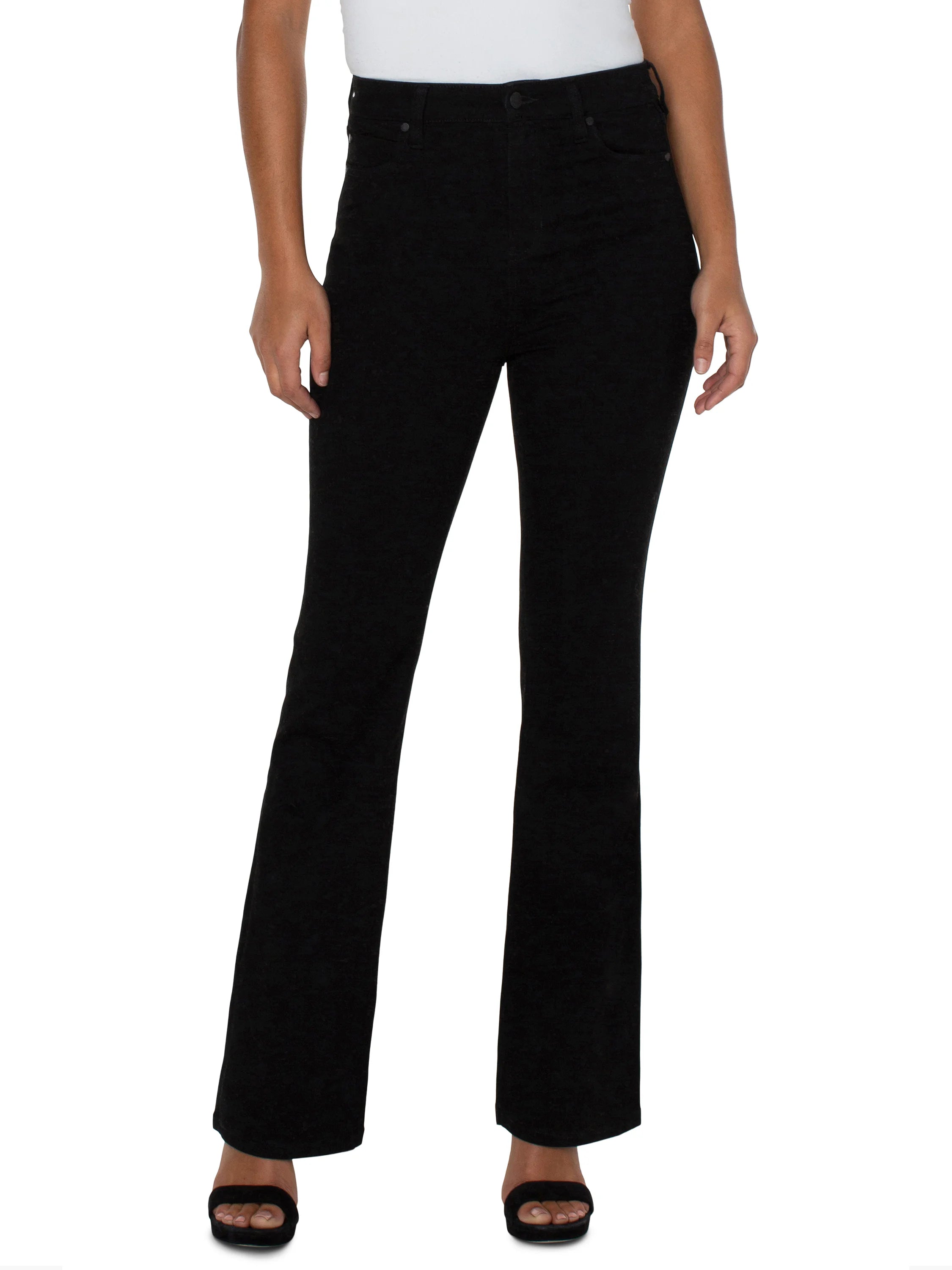 Black bootcut jeans; high-rise waist.