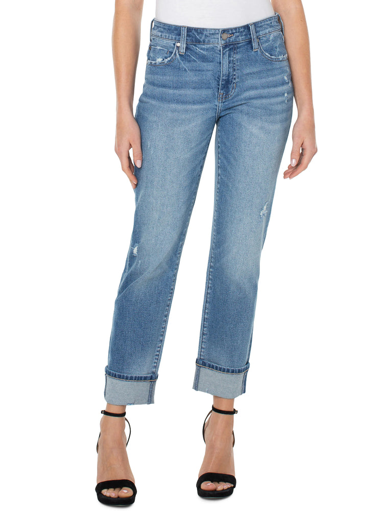 Light wash blue rolled-cuff jeans with distressed details. Mid-rise fit.