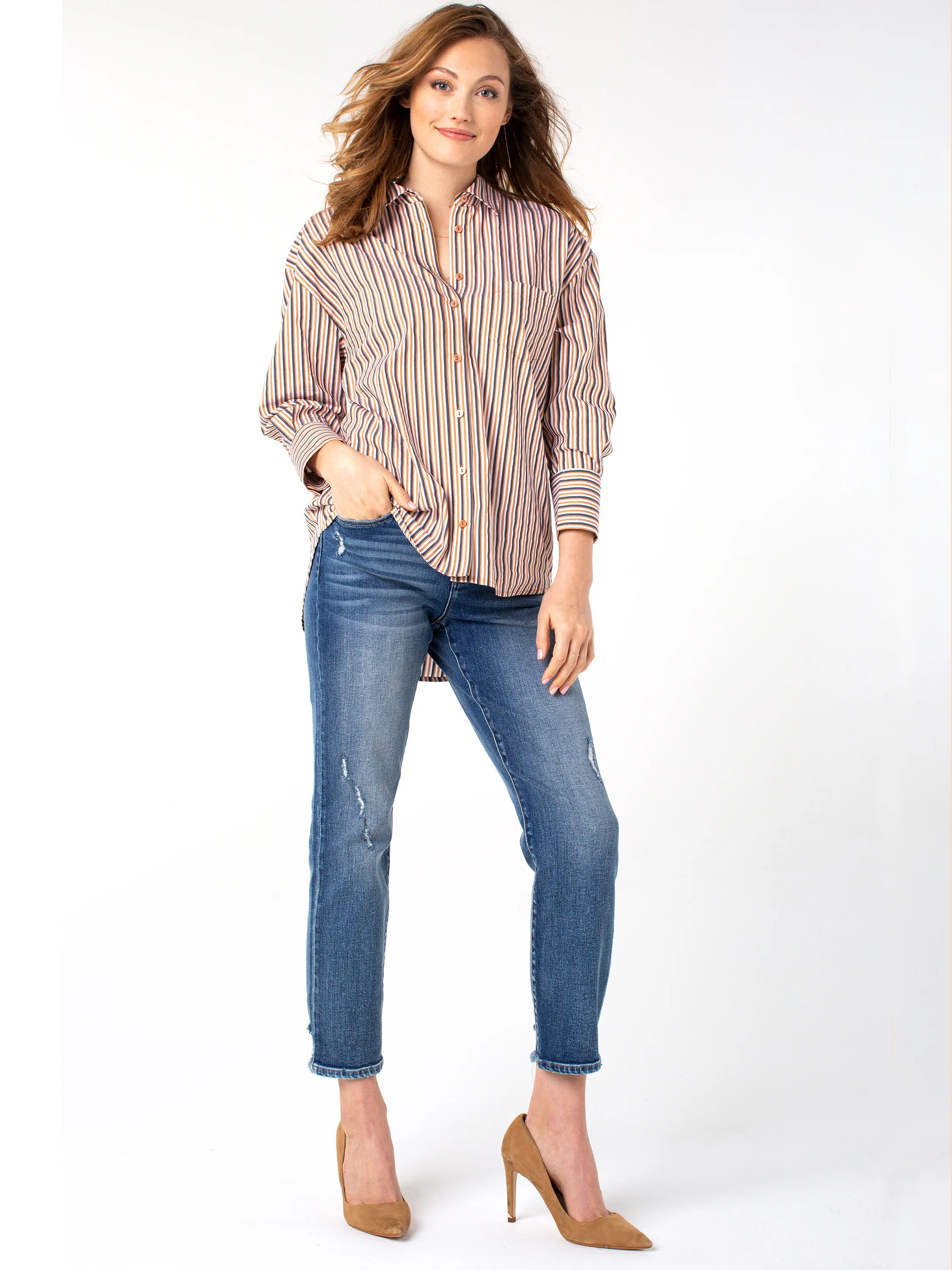 Straight, mid-wash blue jeans with slight distressing. Cropped at the ankle.