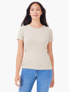 Light beige rib-knit short sleeve crew tee with a fitted silhouette.