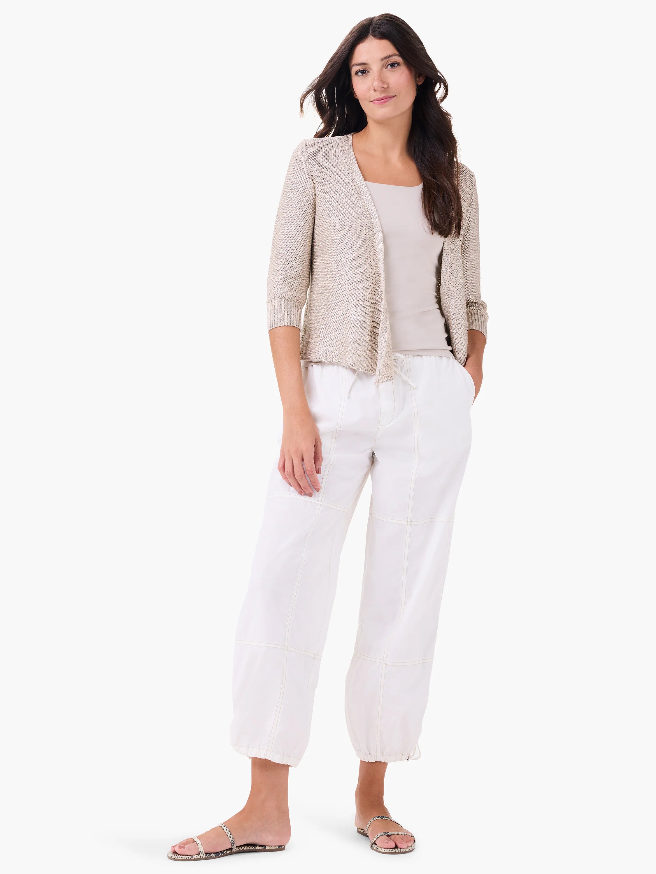 Pale beige scoop neck tank top with a smooth, fitted design.