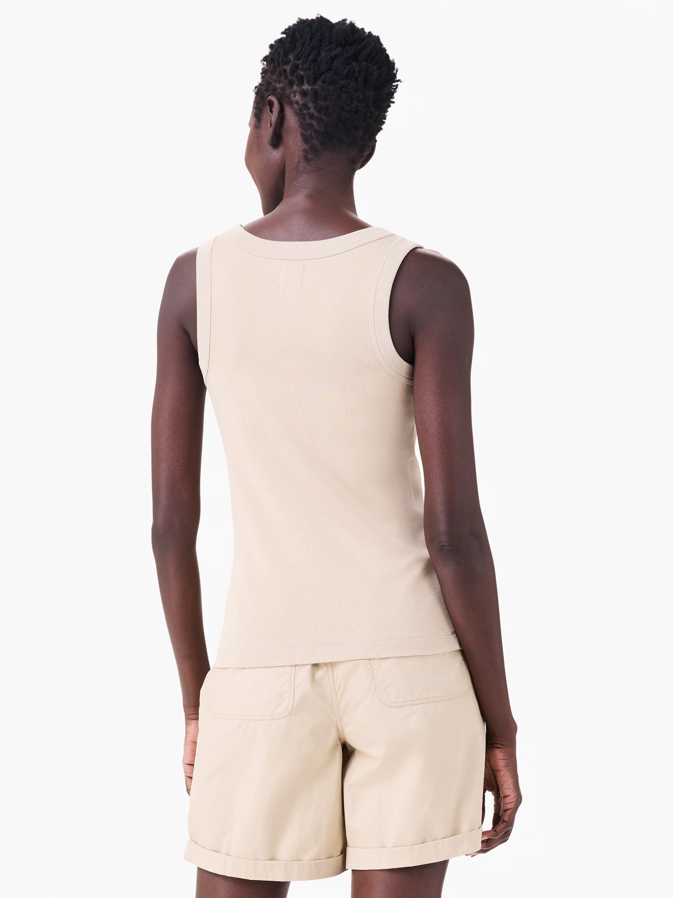 Light beige ribbed knit scoop tank top, shown from the back on a model.