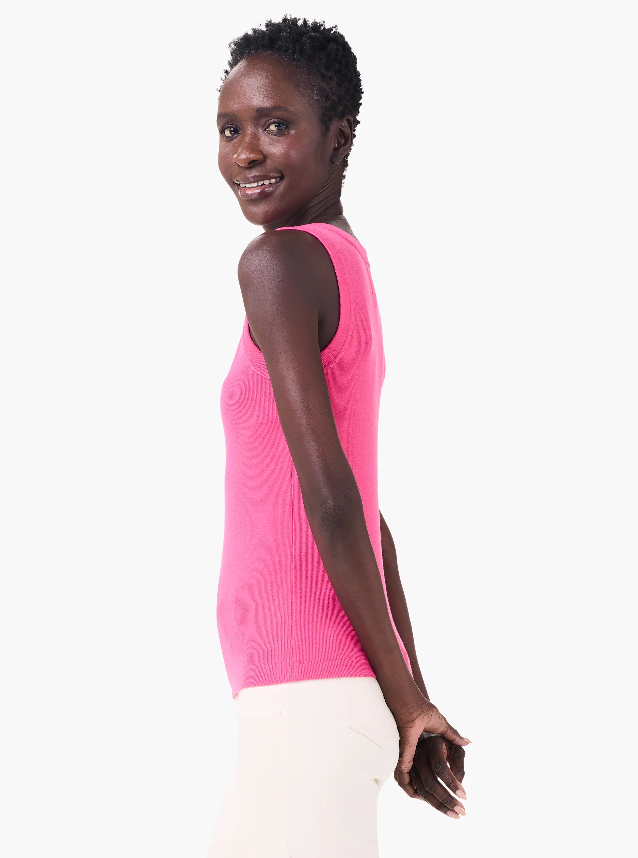 Vibrant pink ribbed knit scoop tank. Fitted style with a scoop neckline.
