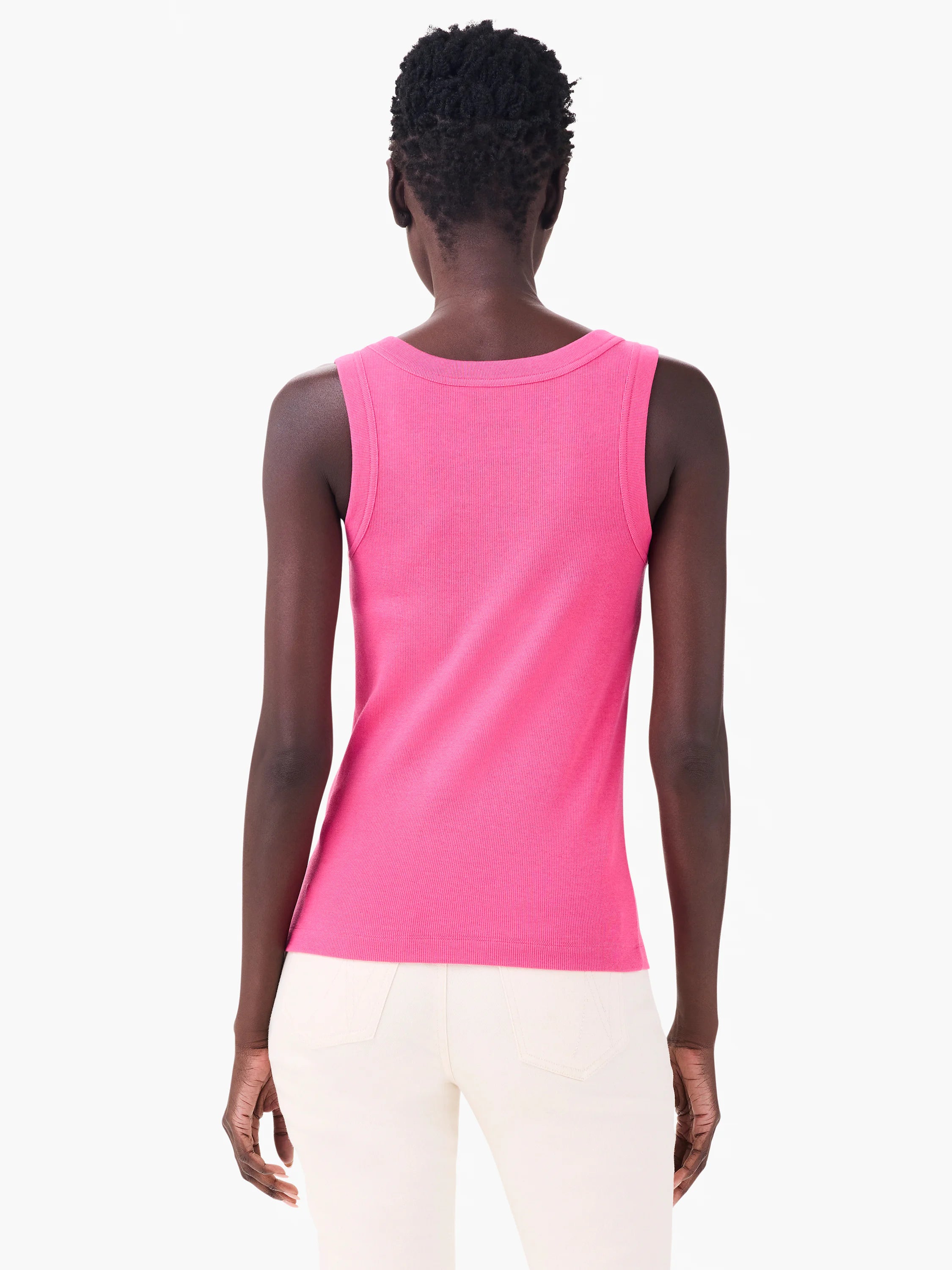Bright pink rib knit scoop tank, shown from the back on a model.
