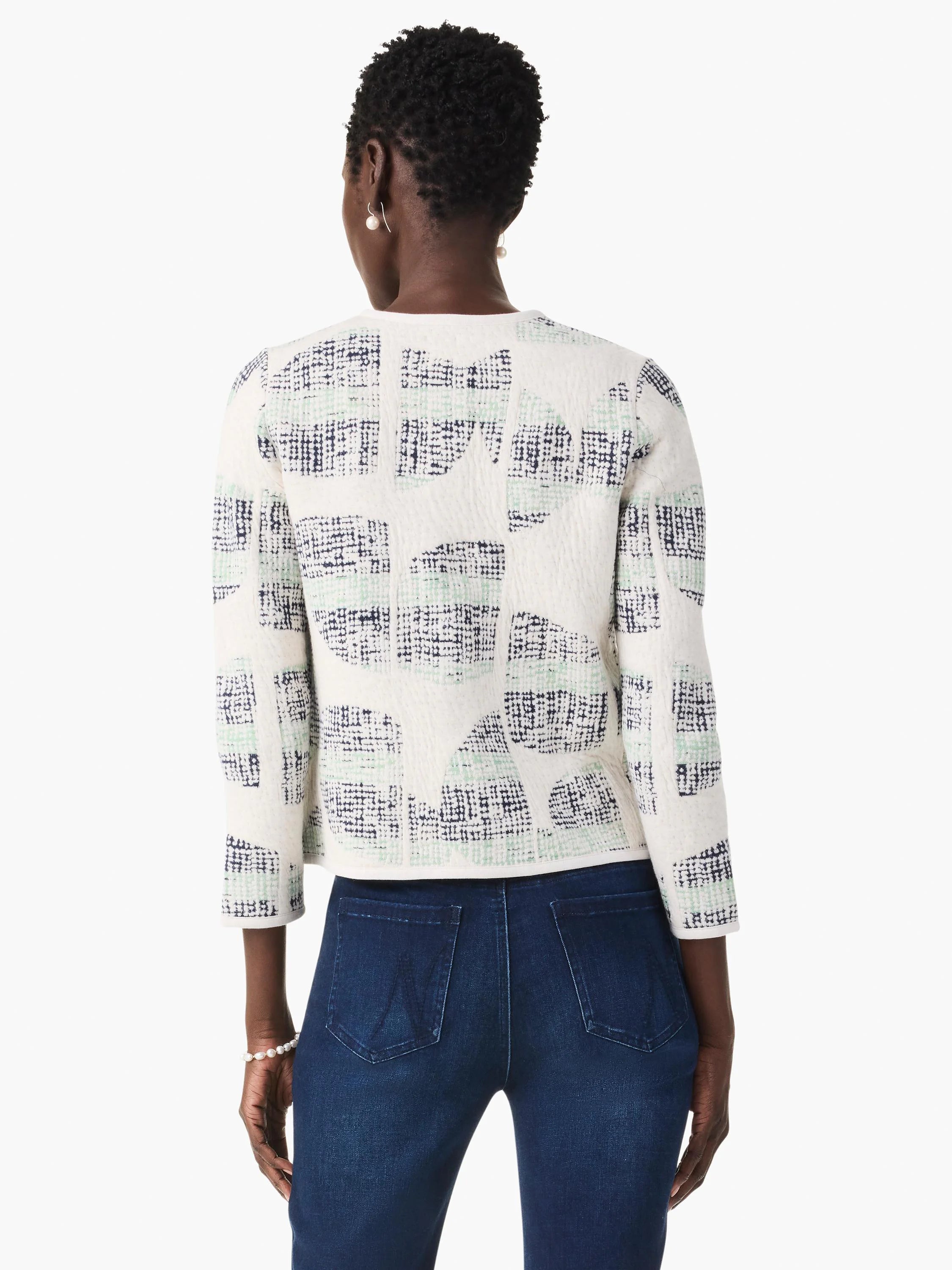 Cream knit jacket with textured navy and sage green abstract circle & square pattern, cropped length, 3/4 sleeves.