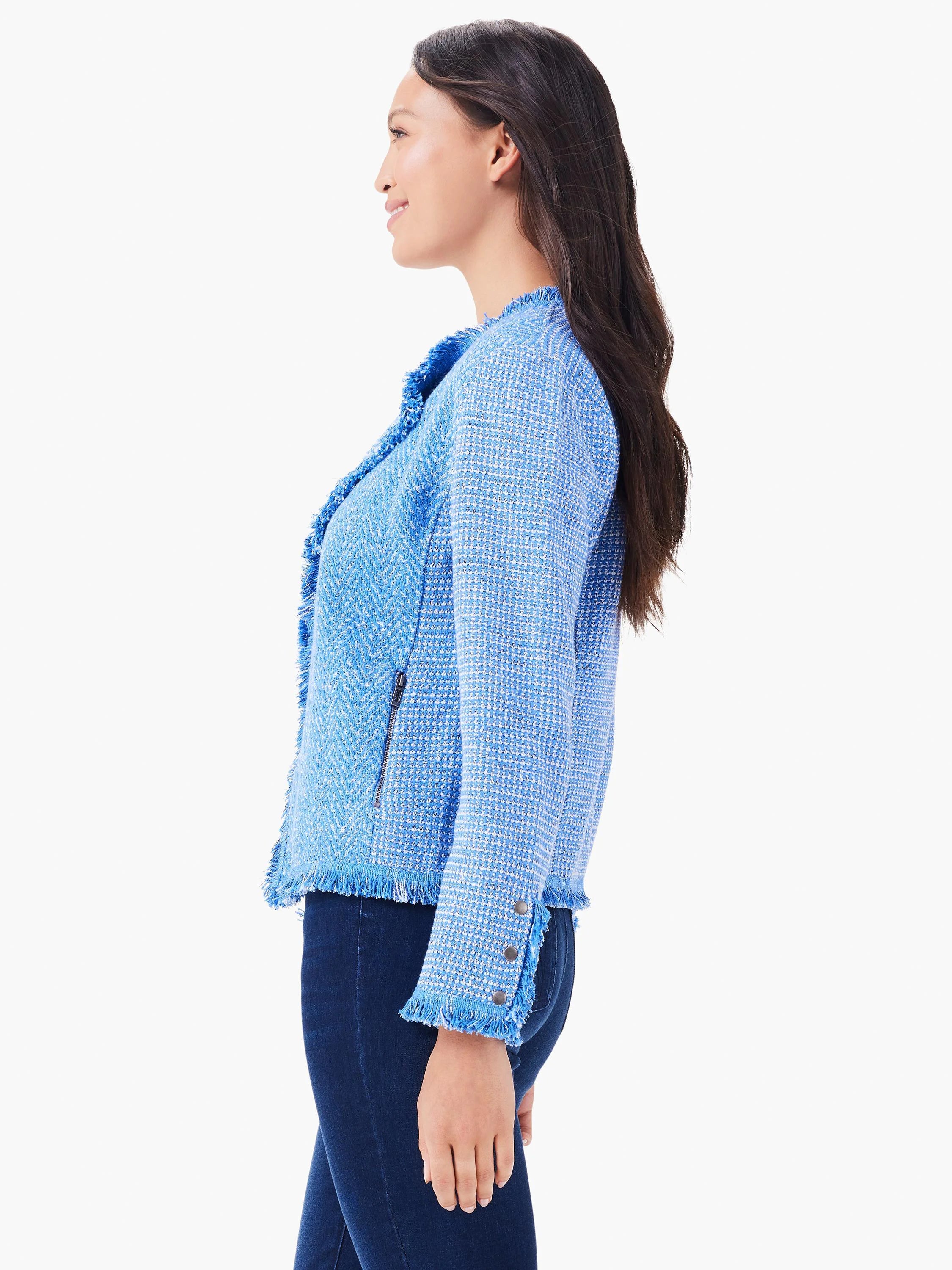 Blue & white mixed knit jacket with fringed collar, hem, and cuffs. Features a side zipper pocket and cuff buttons.