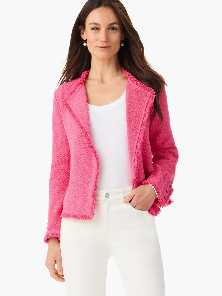Pink knit jacket with fringe trim on the open front, neckline, and cuffs.