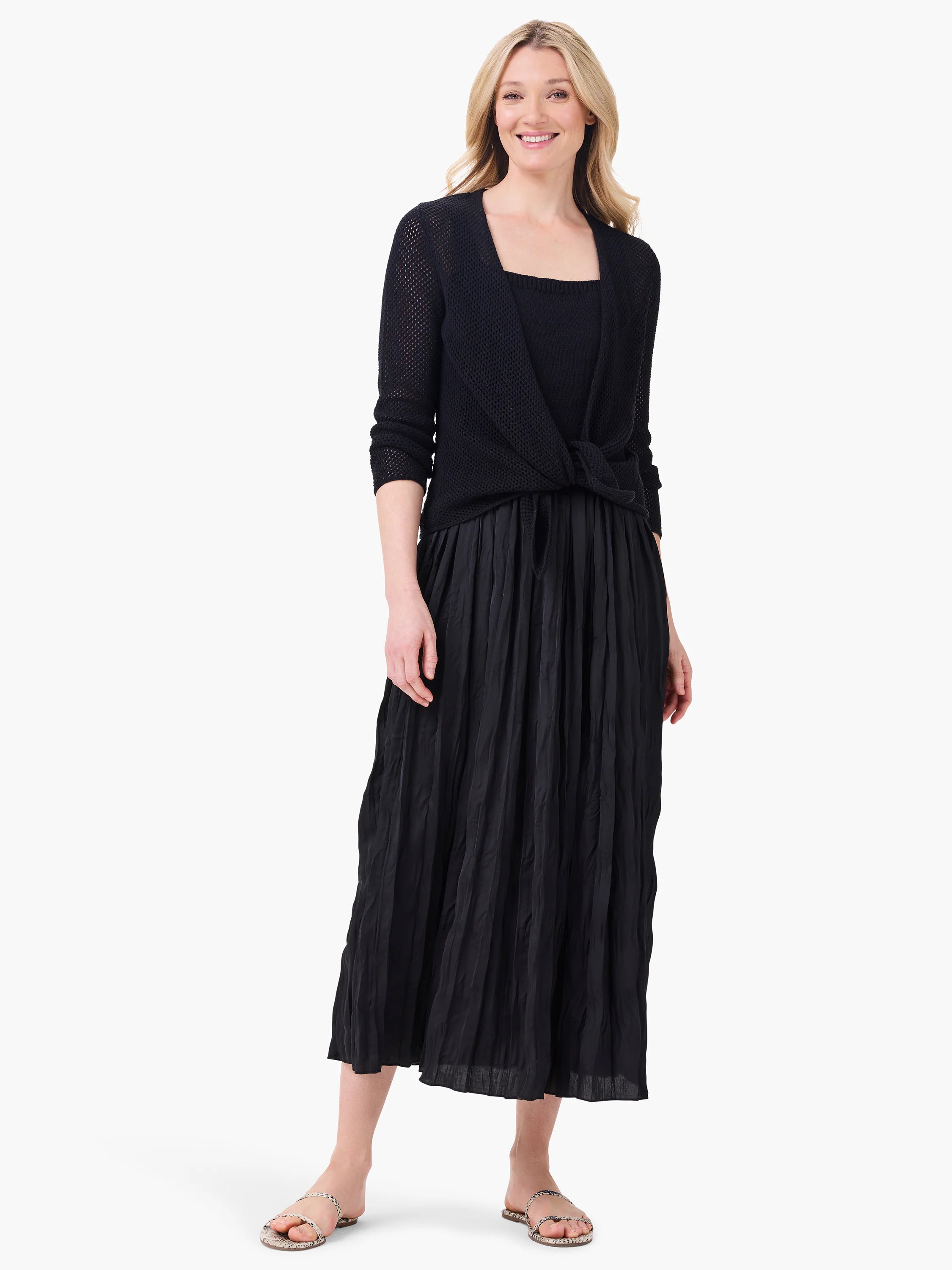Black Kara Dress. Features a square neckline and a long, crinkled skirt.