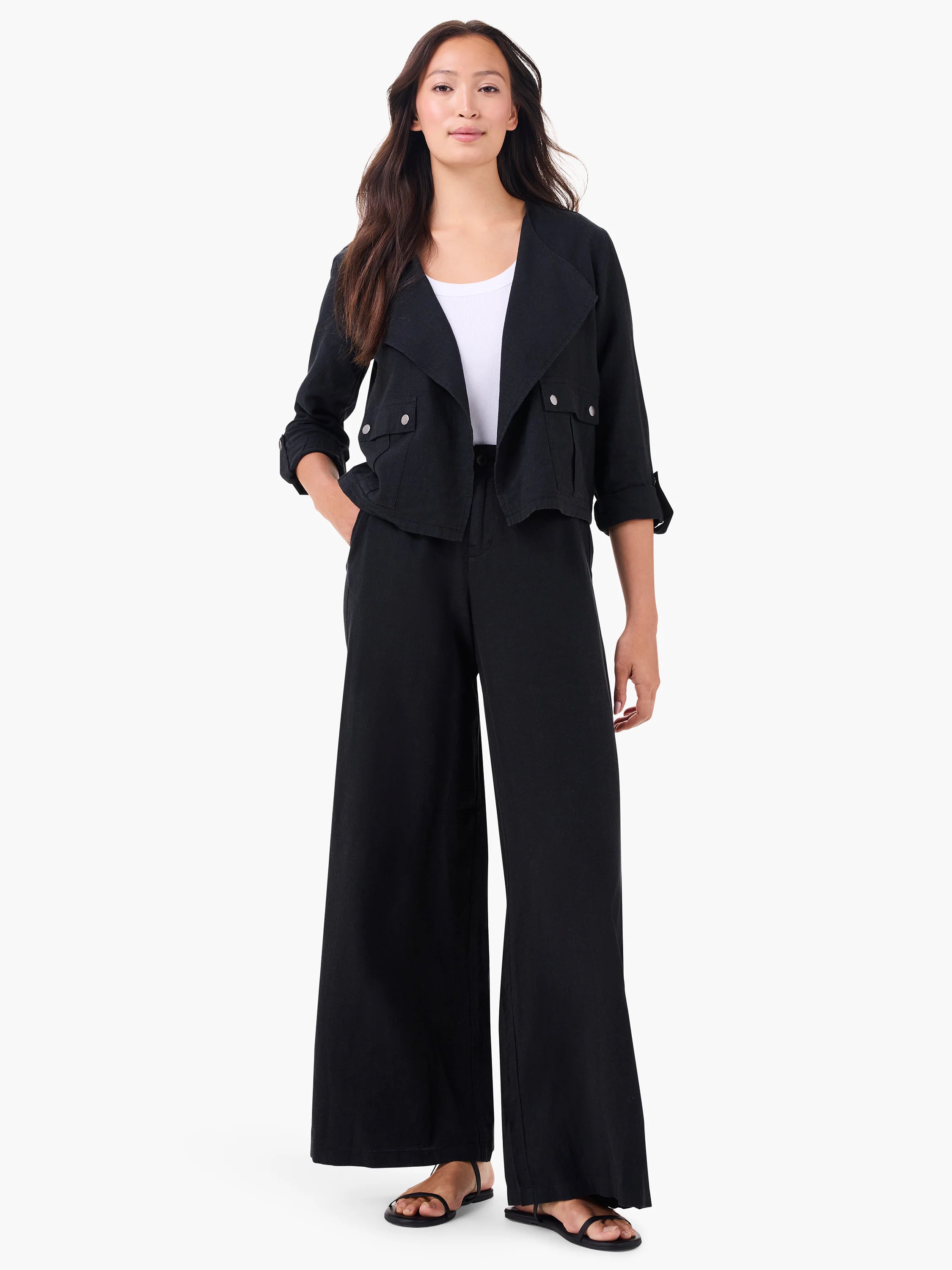 Black linen moto jacket. Cropped, open style with draped lapels, two chest patch pockets (silver snaps), and cuffed 3/4...