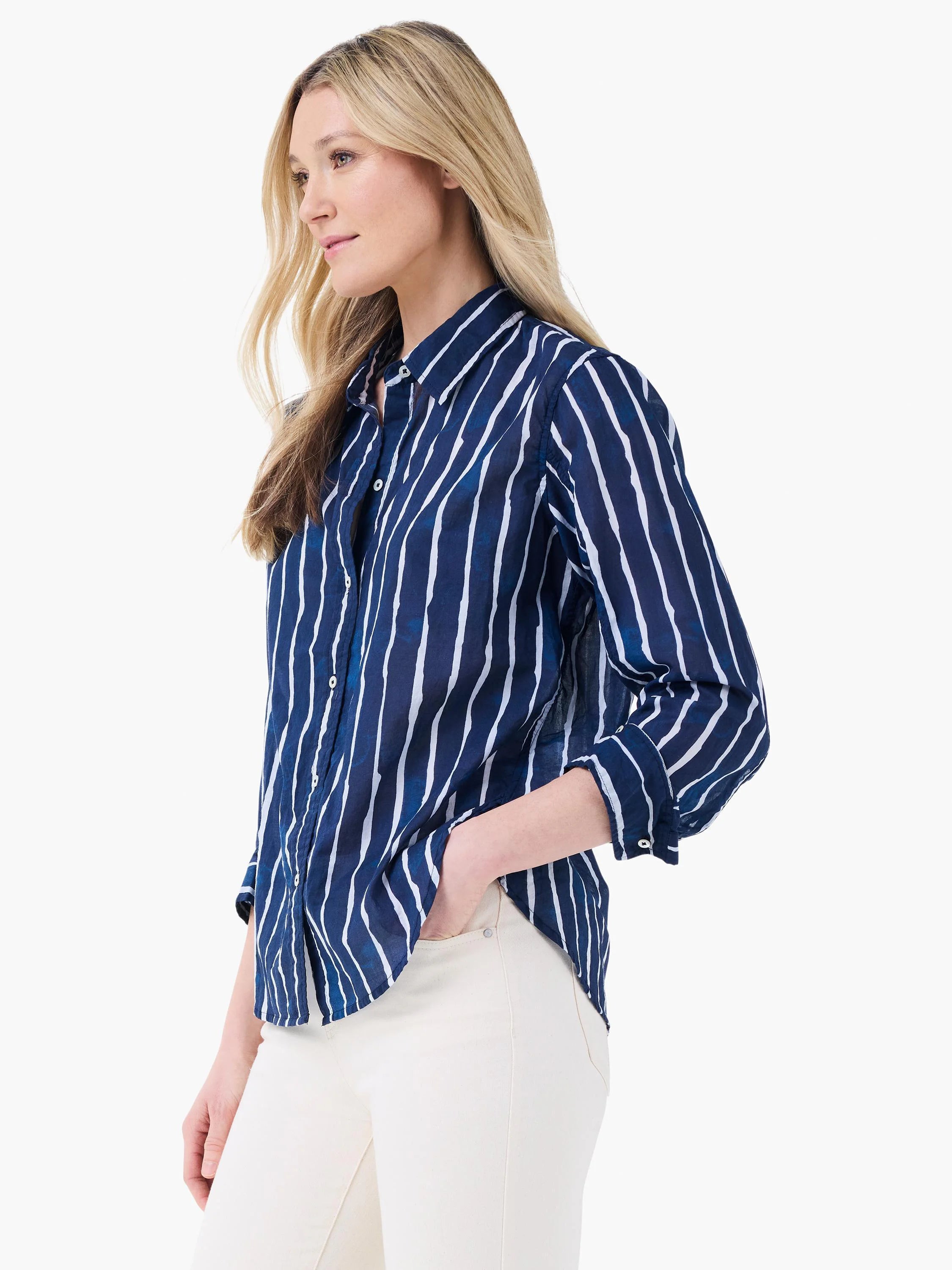 Navy button-down shirt with uneven white watercolor-style vertical stripes.