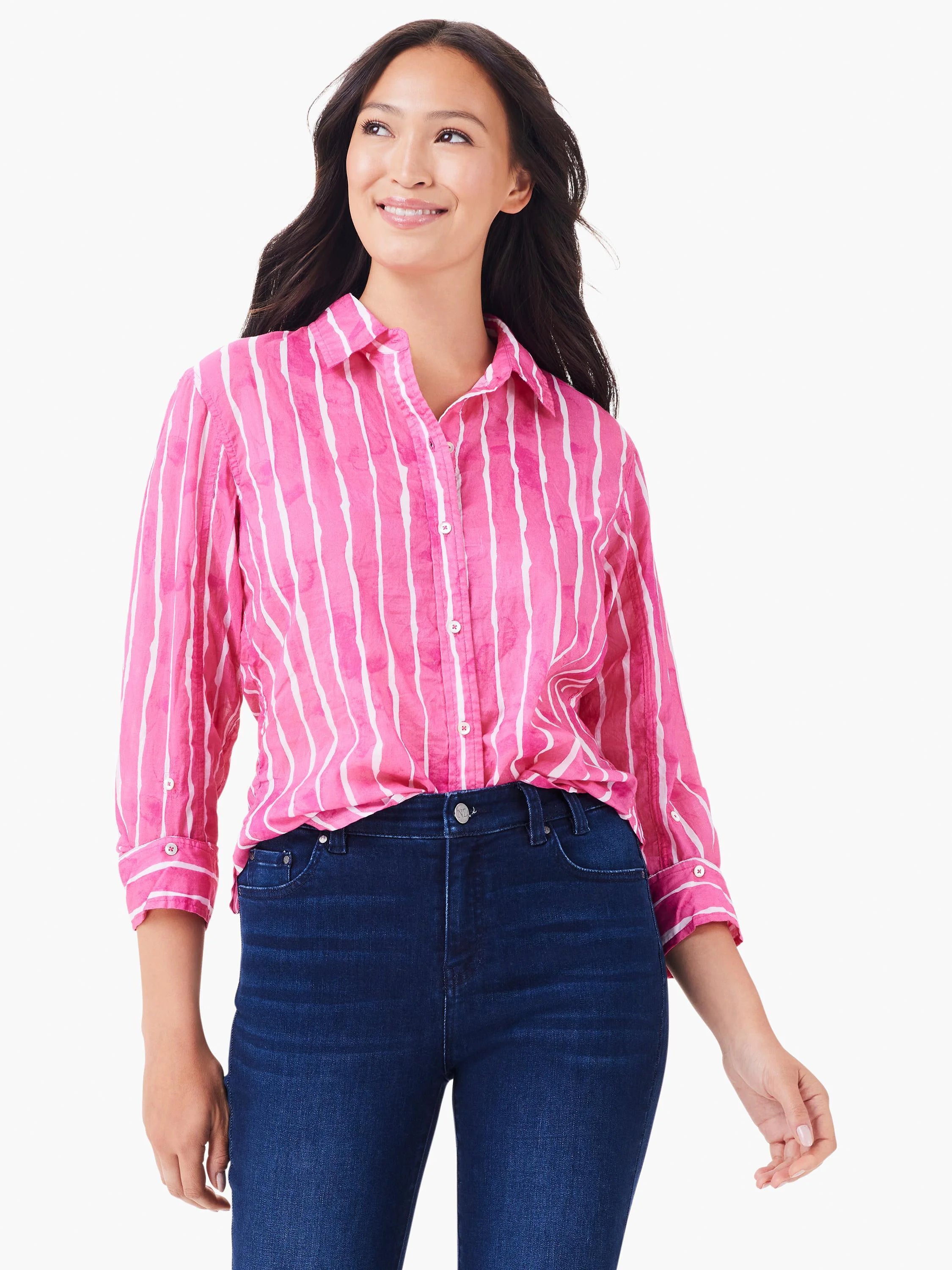 Bright pink button-up shirt with uneven white vertical watercolor stripes and 3/4 cuffed sleeves.