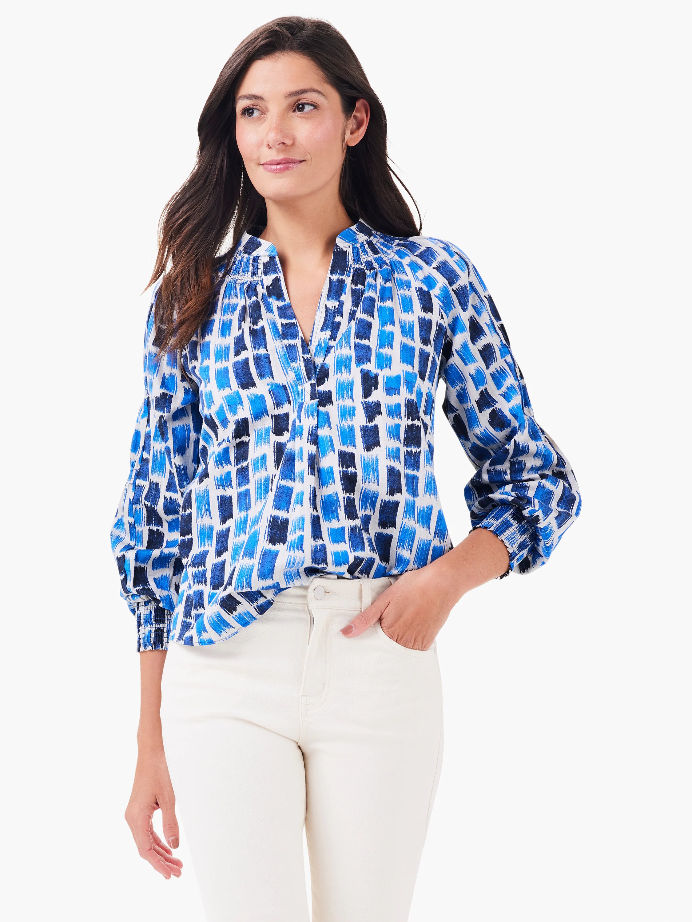 Brushstroke Blues Top. White blouse with varied blue brushstroke rectangles. V-neck, gathered collar and cuffs.