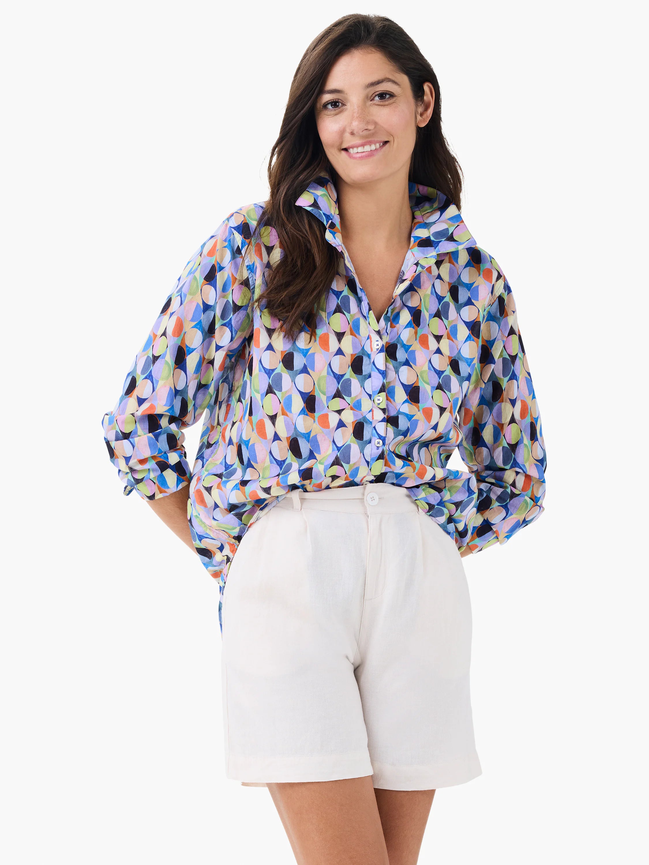 Multi-color boyfriend shirt with an abstract circle pattern in blue, green, orange, purple, and black. Rolled sleeves.