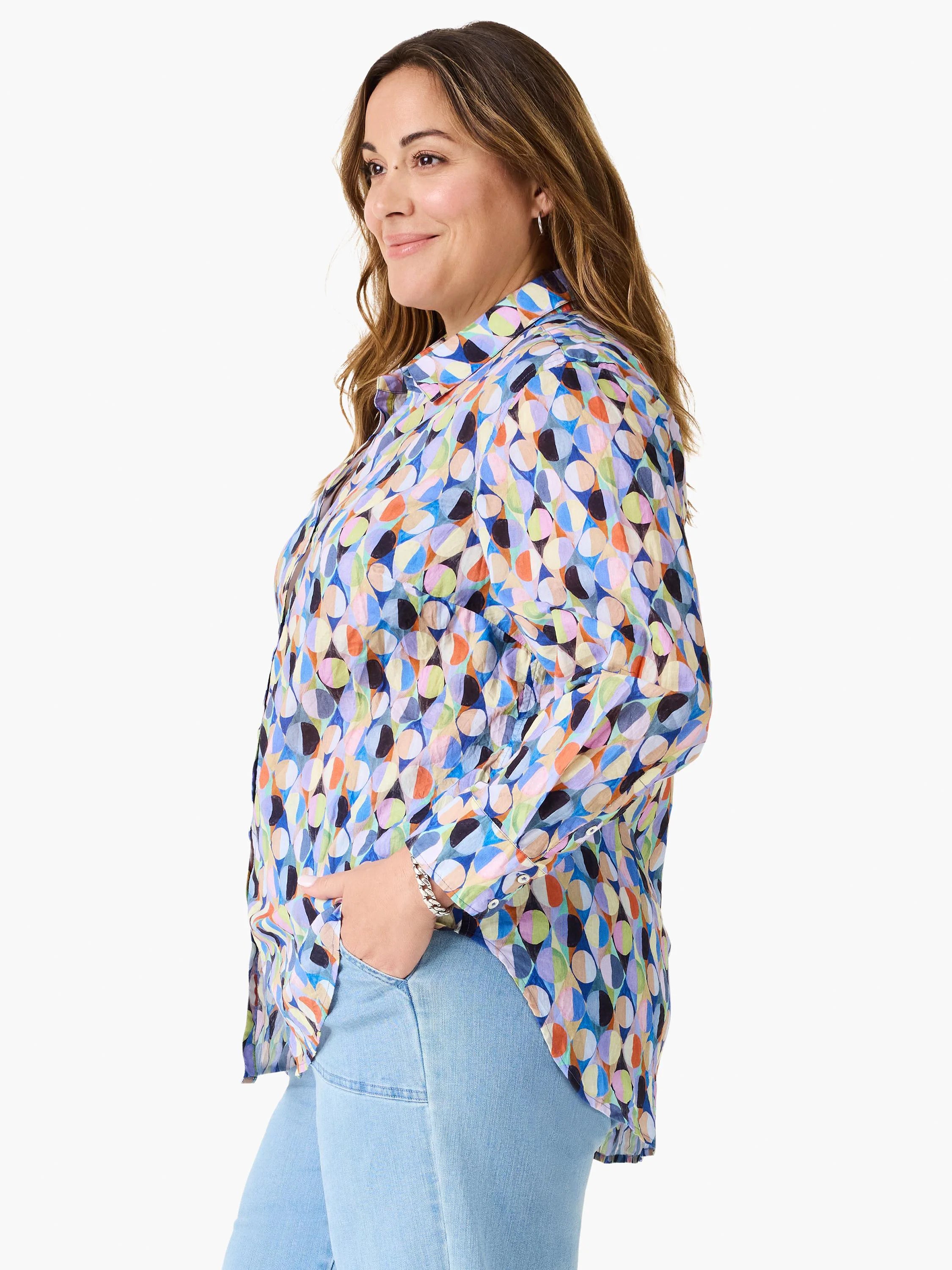 Boyfriend shirt with a multi-colored abstract pattern of interlocking circles in blues, greens, oranges, and pinks.