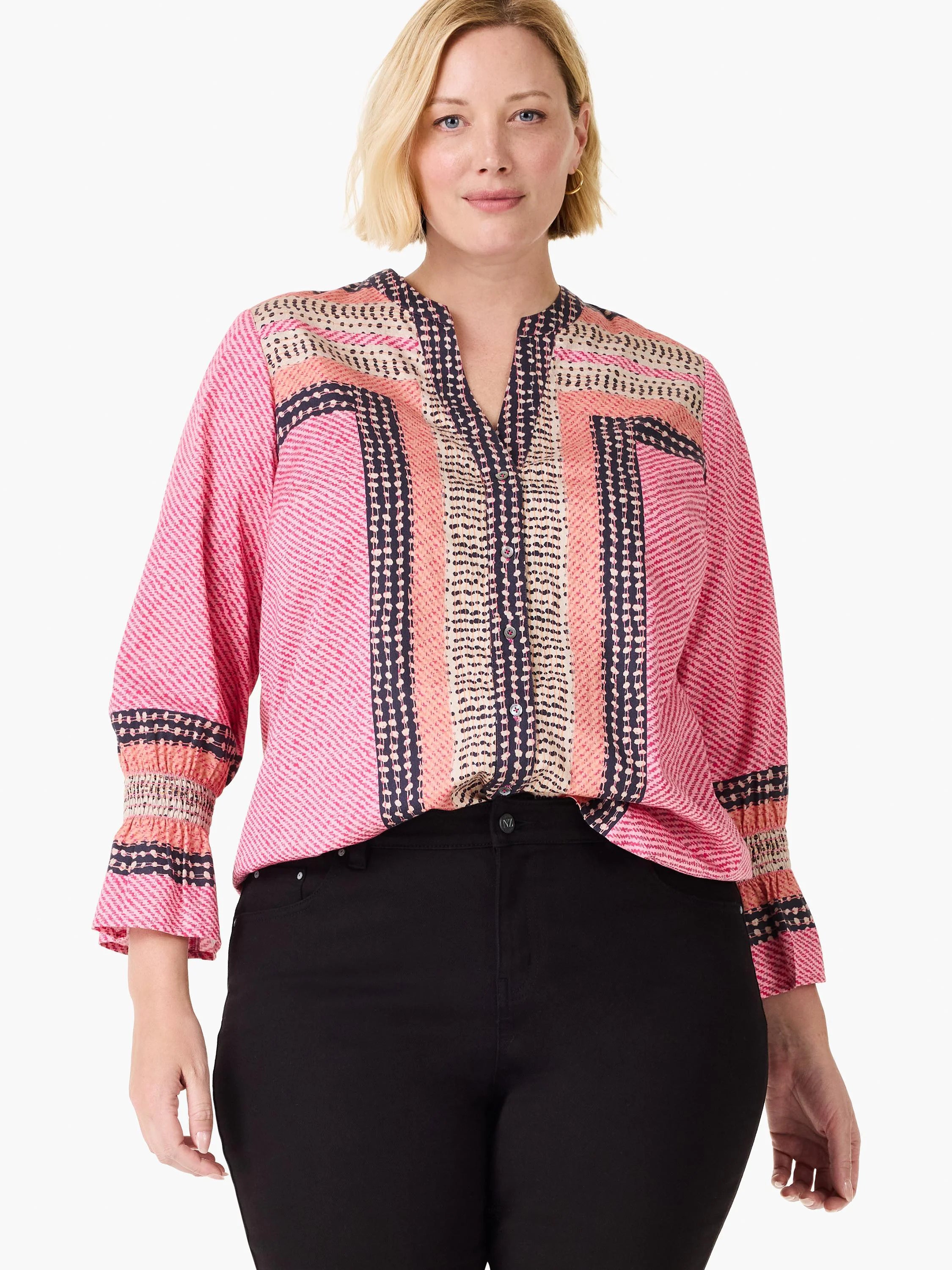 Pink top with navy, peach, & cream striped & dotted patterns on body, placket, & smocked cuffs.