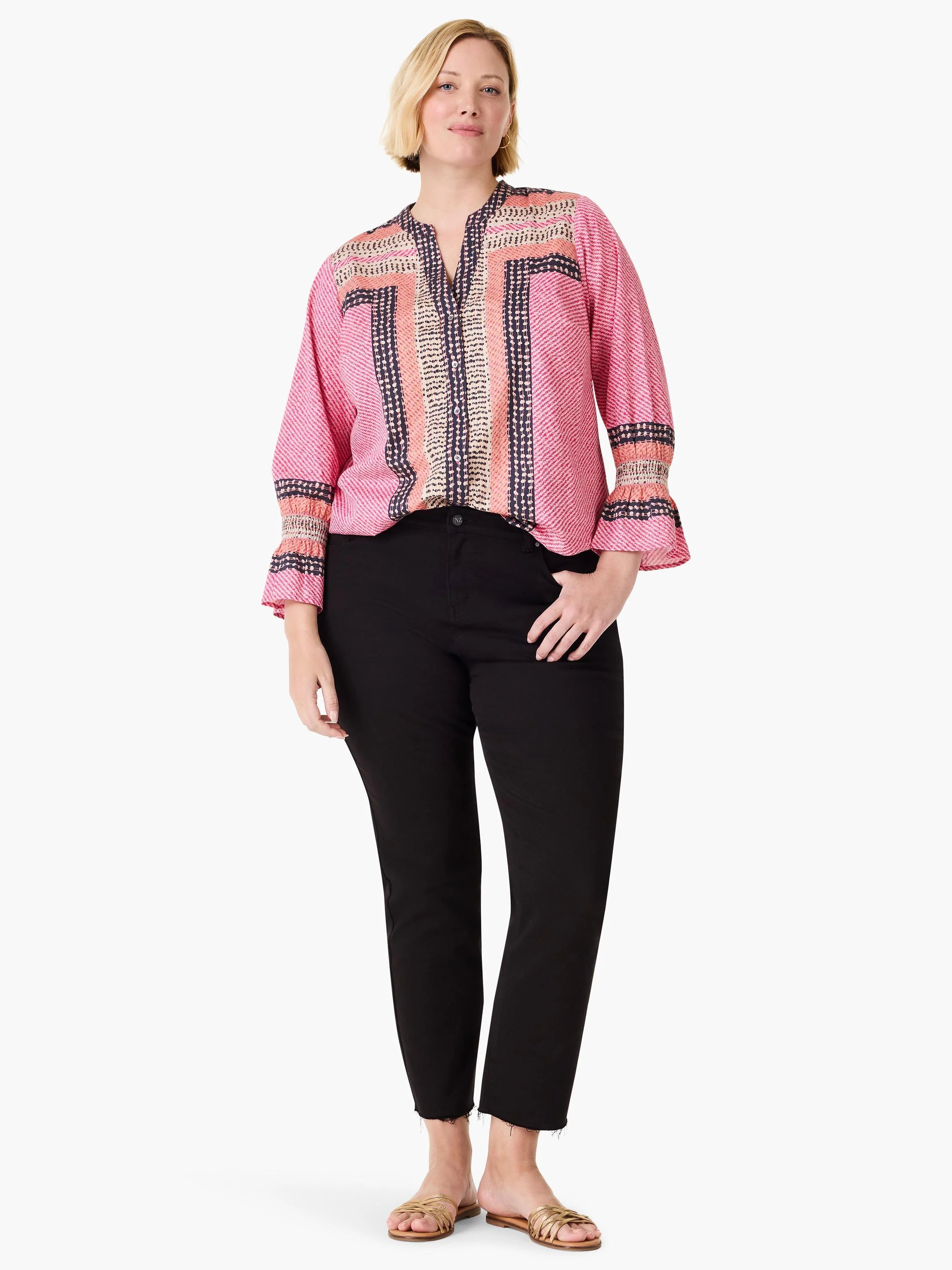 Pink top with diagonal stripes, V-neck. Features navy, peach, cream geometric spot-and-stripe patterns on front and...