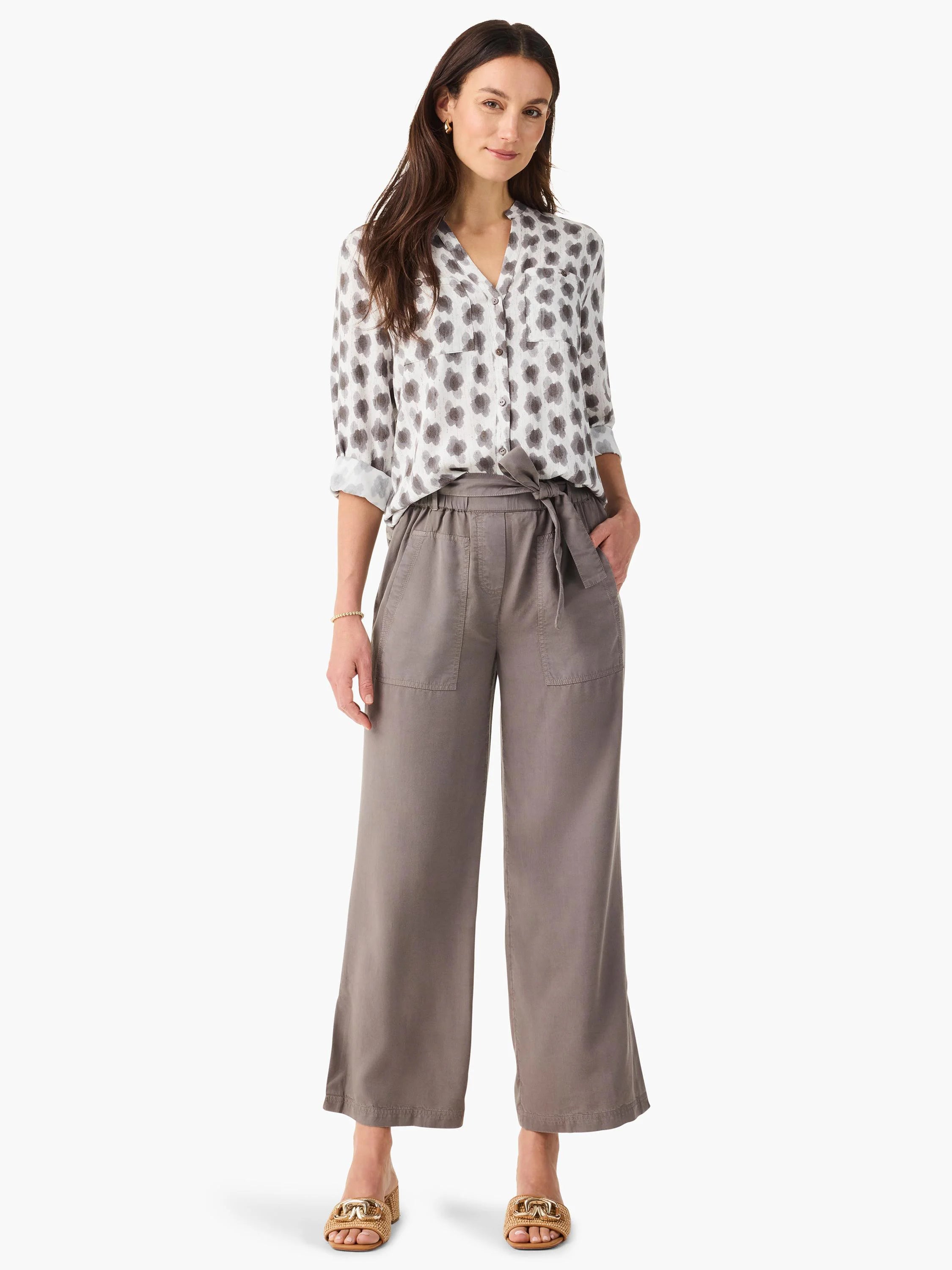 Light grey button-front shirt with dark grey clover-stamp pattern. Band collar, rolled long sleeves.