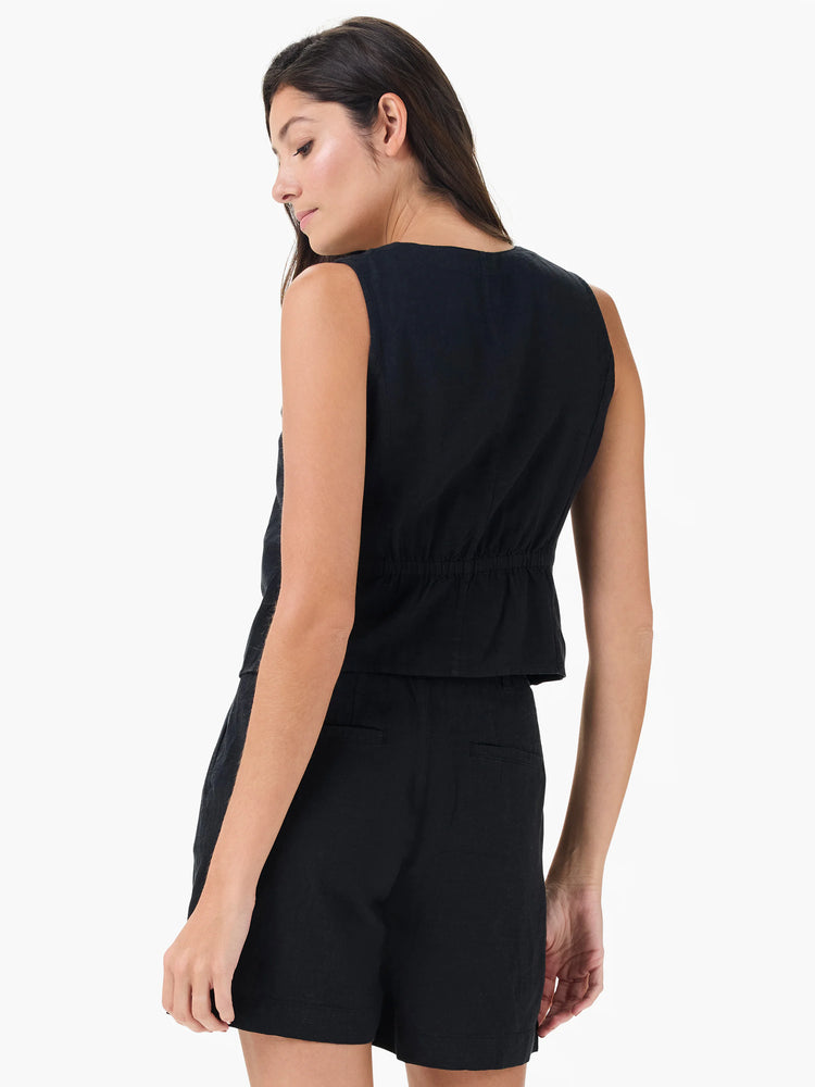 Black sleeveless linen vest with a cinched waist. Shown from the back.