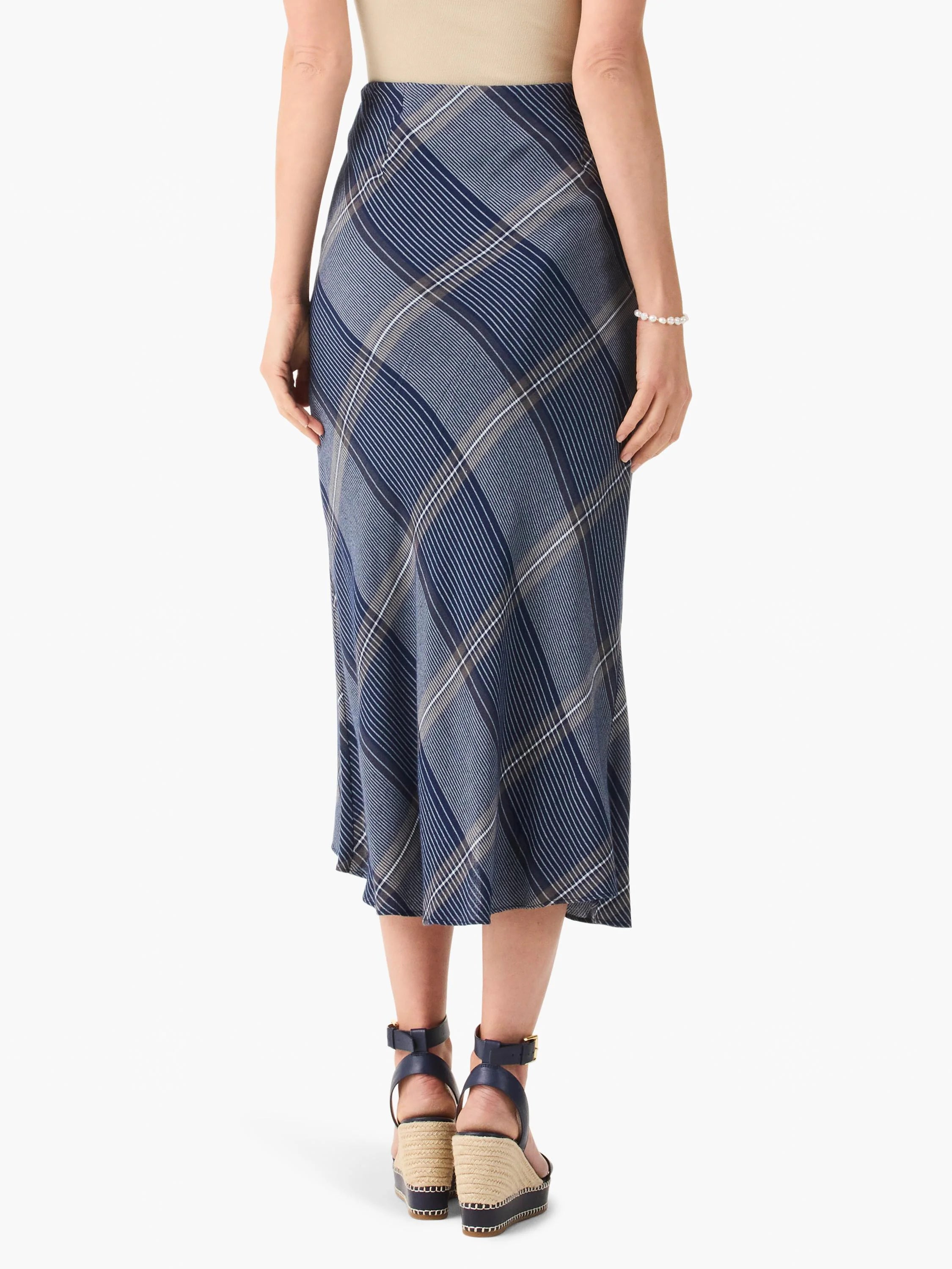 Midi-length skirt, blue, gray, and white plaid pattern, A-line silhouette.
