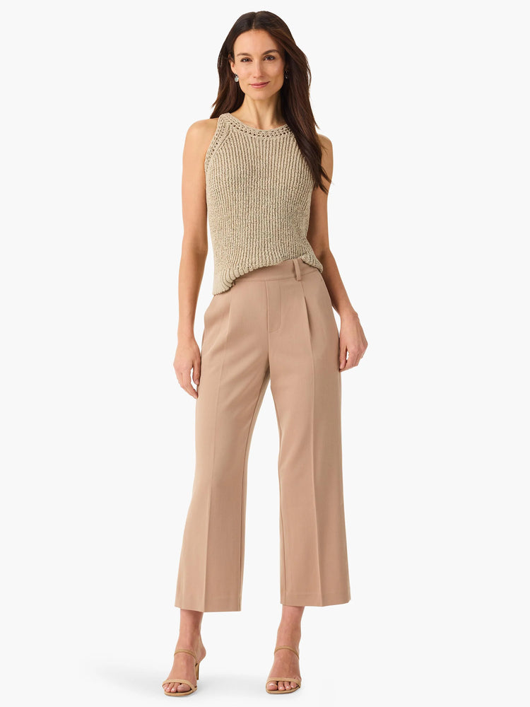Beige wide-leg cropped trousers; pleated front. Model wears a light beige top.