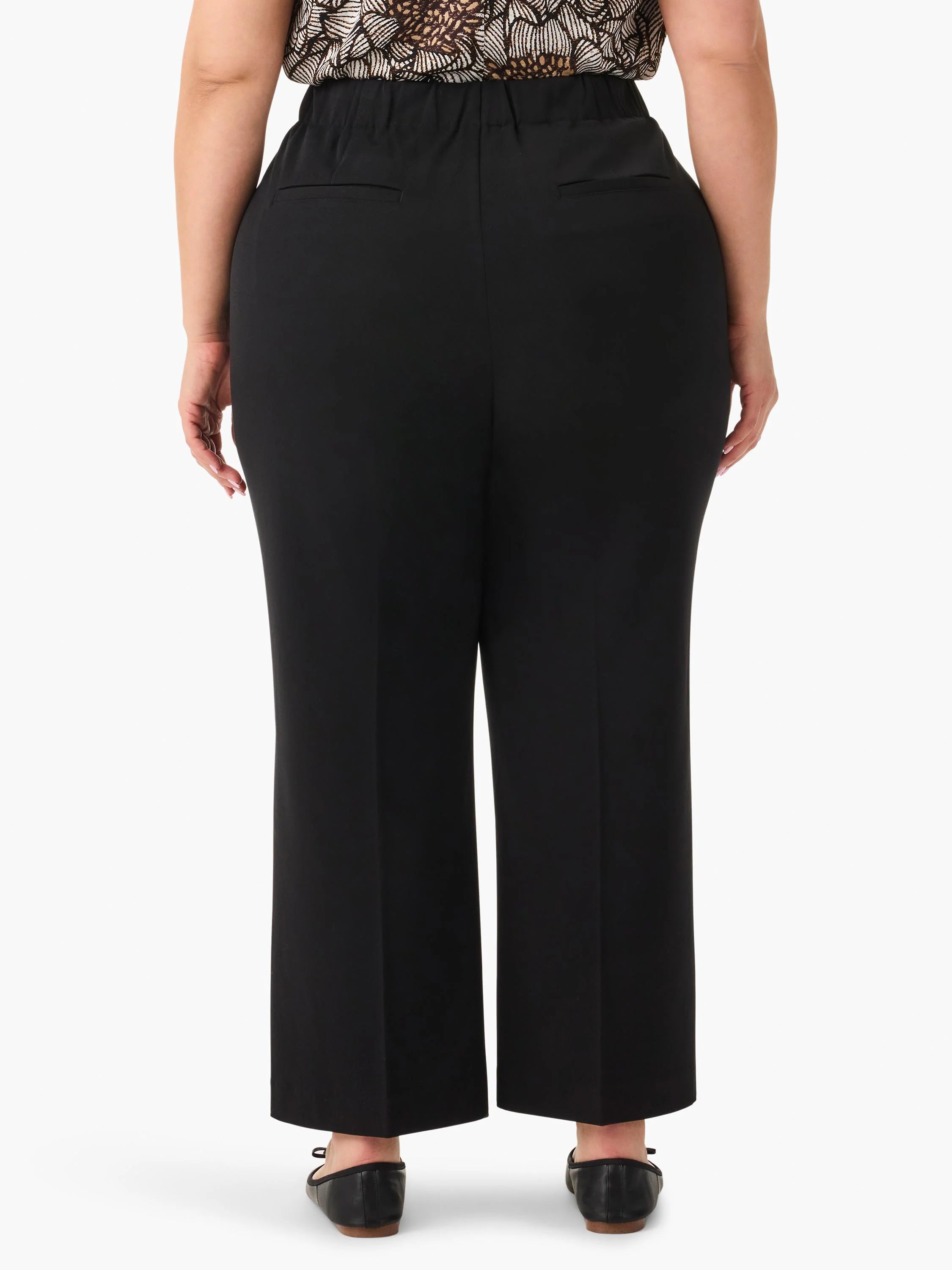 Black wide-leg cropped trousers, shown from the back. Elastic waistband, pockets.
