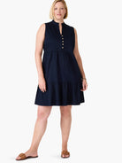 Navy blue sleeveless tiered dress with gold buttons down the front.  The dress has a small collar.