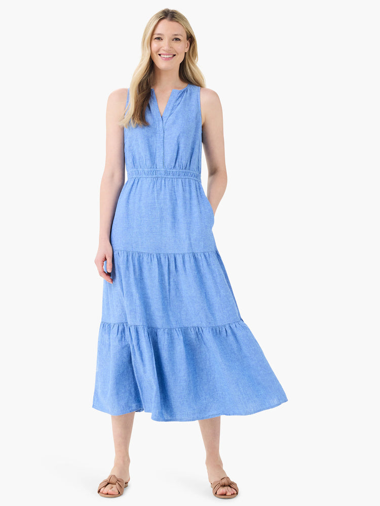 Light blue linen midi dress, sleeveless, V-neck, tiered skirt, and empire waist.