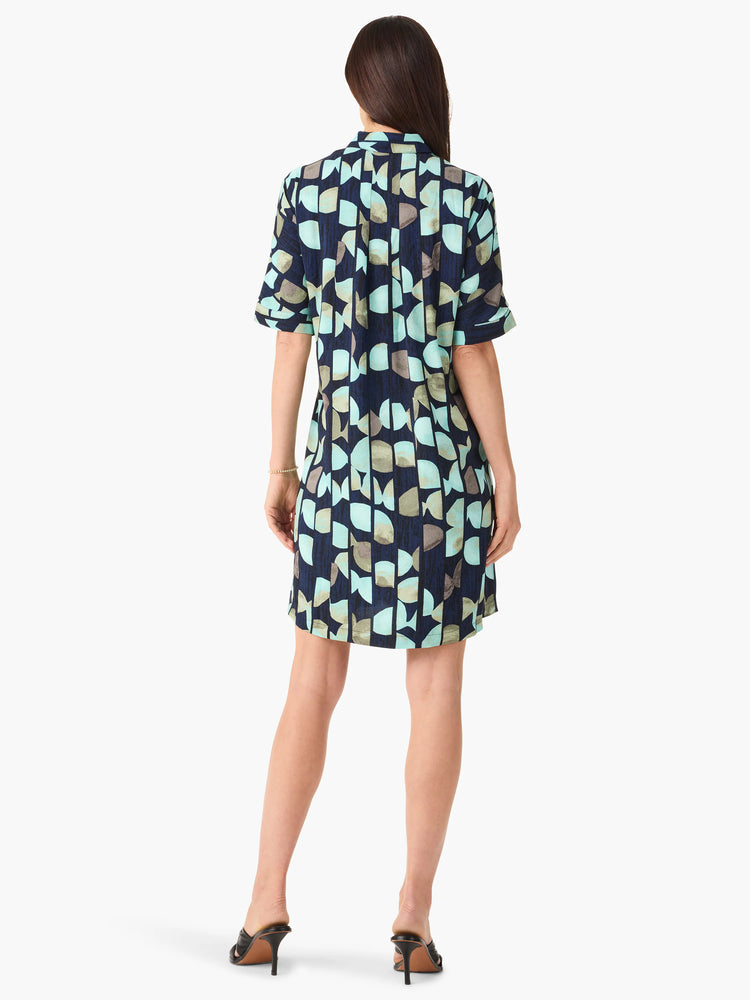 Here's alt text that meets the requirements:
"Navy blue short-sleeved shift dress with teal and taupe abstract print. ...
