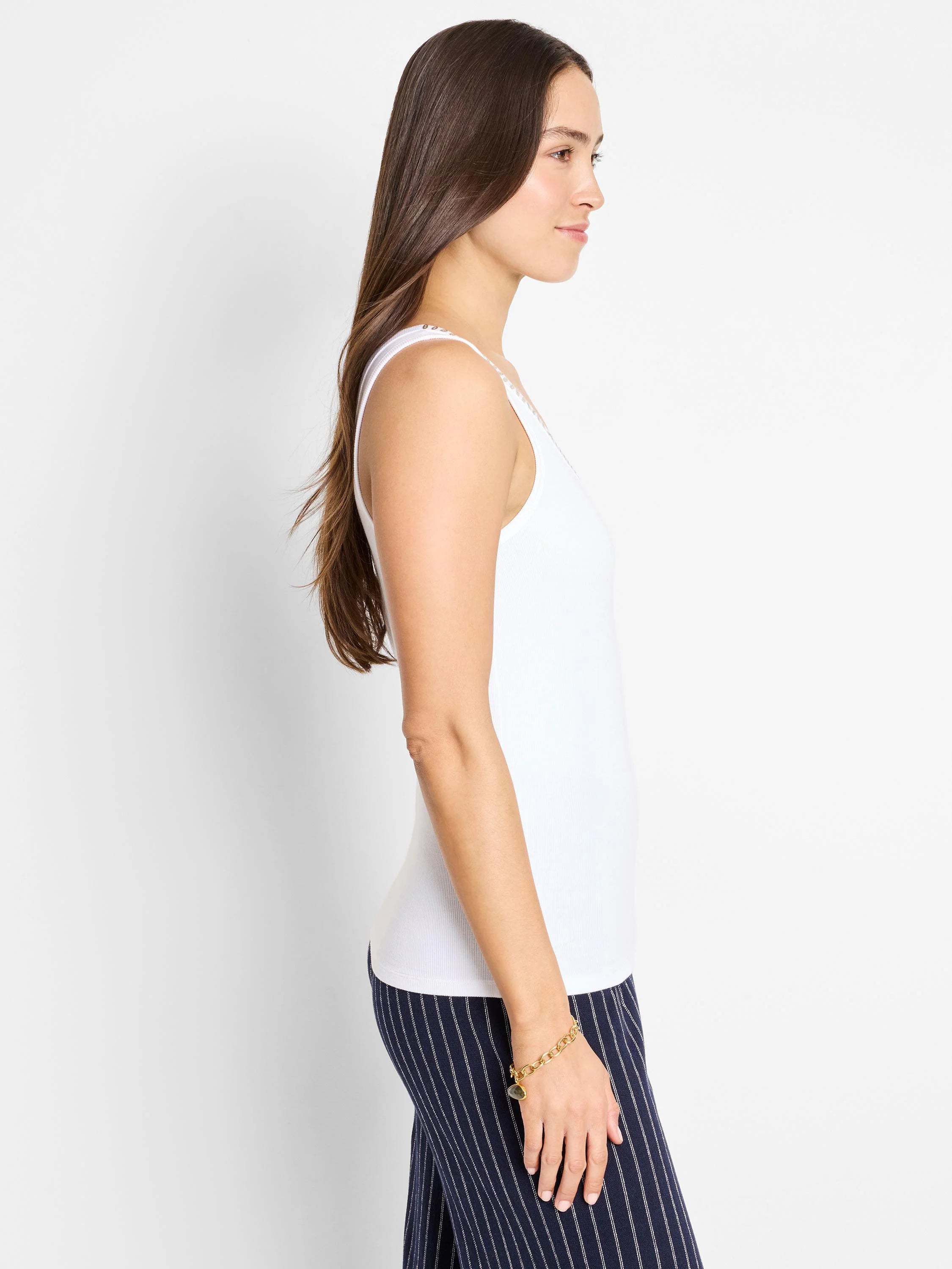 White ribbed tank top with a subtle shimmer trim.