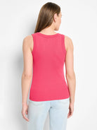 Fitted, ribbed pink scoop neck tank top, seen from the back on a model.