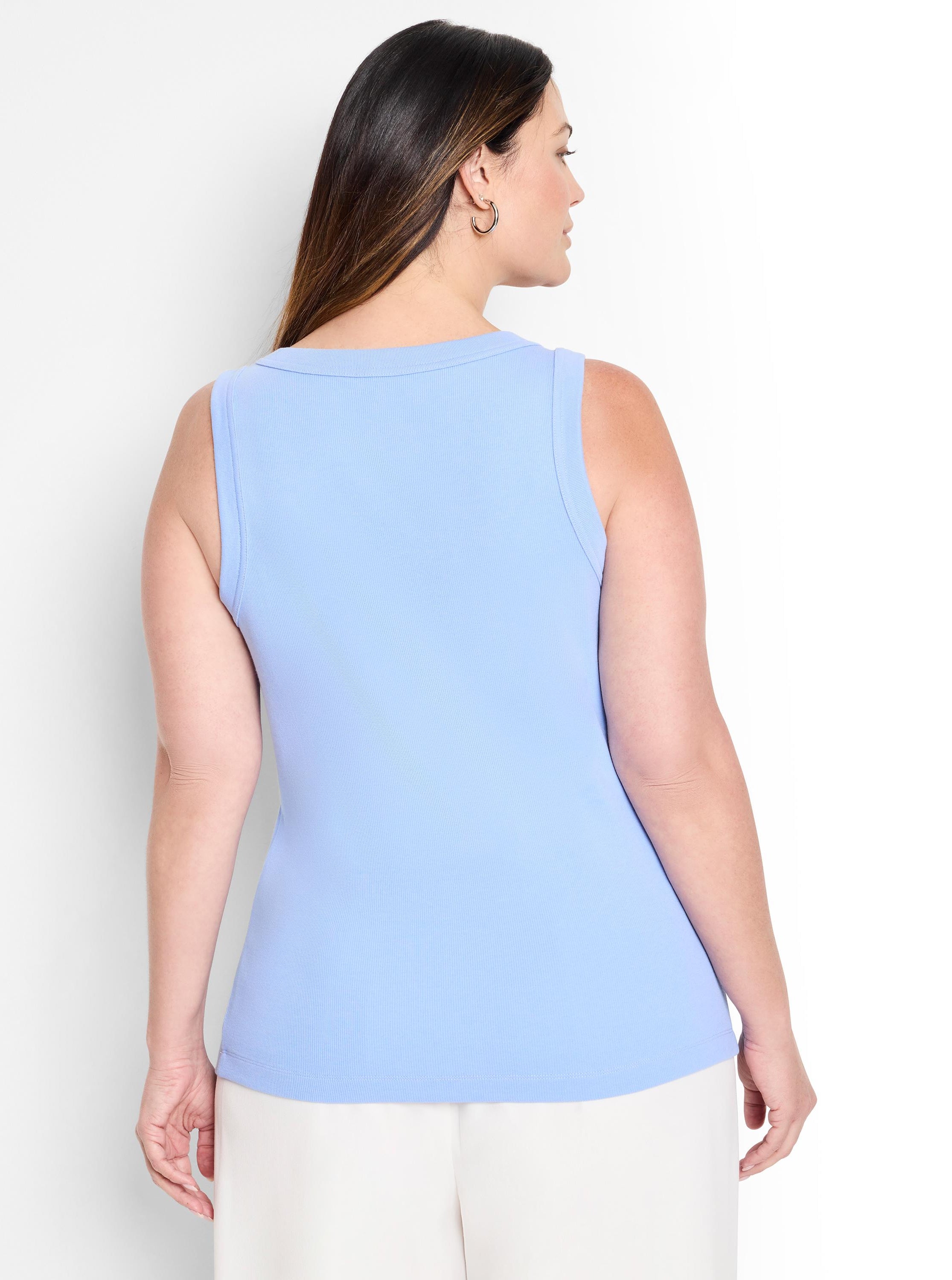 A fitted light blue ribbed knit tank top featuring a scoop back.