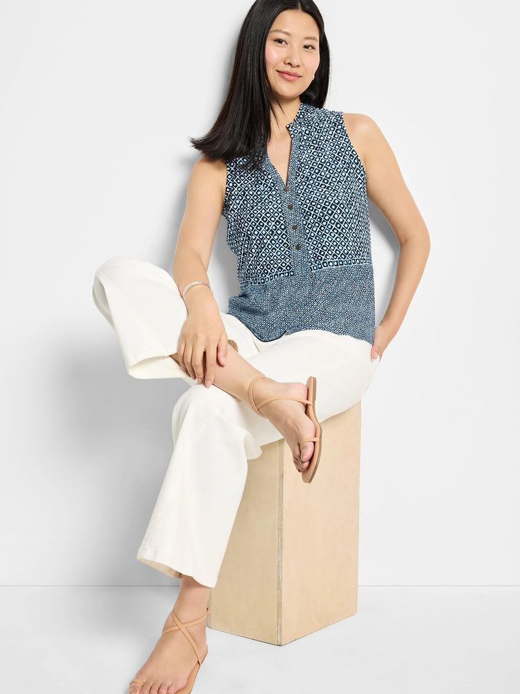 Sleeveless tank top, blue and white geometric pattern, button front.