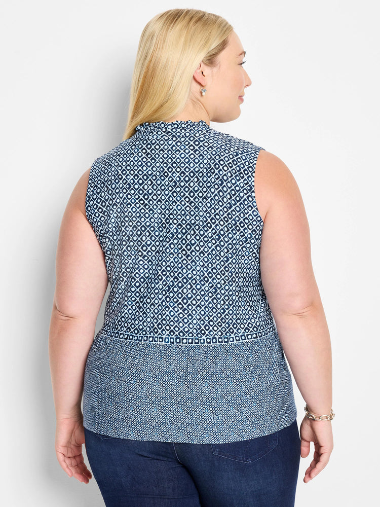 Sleeveless knit tank; blue and white geometric pattern. Bottom features slightly different texture.