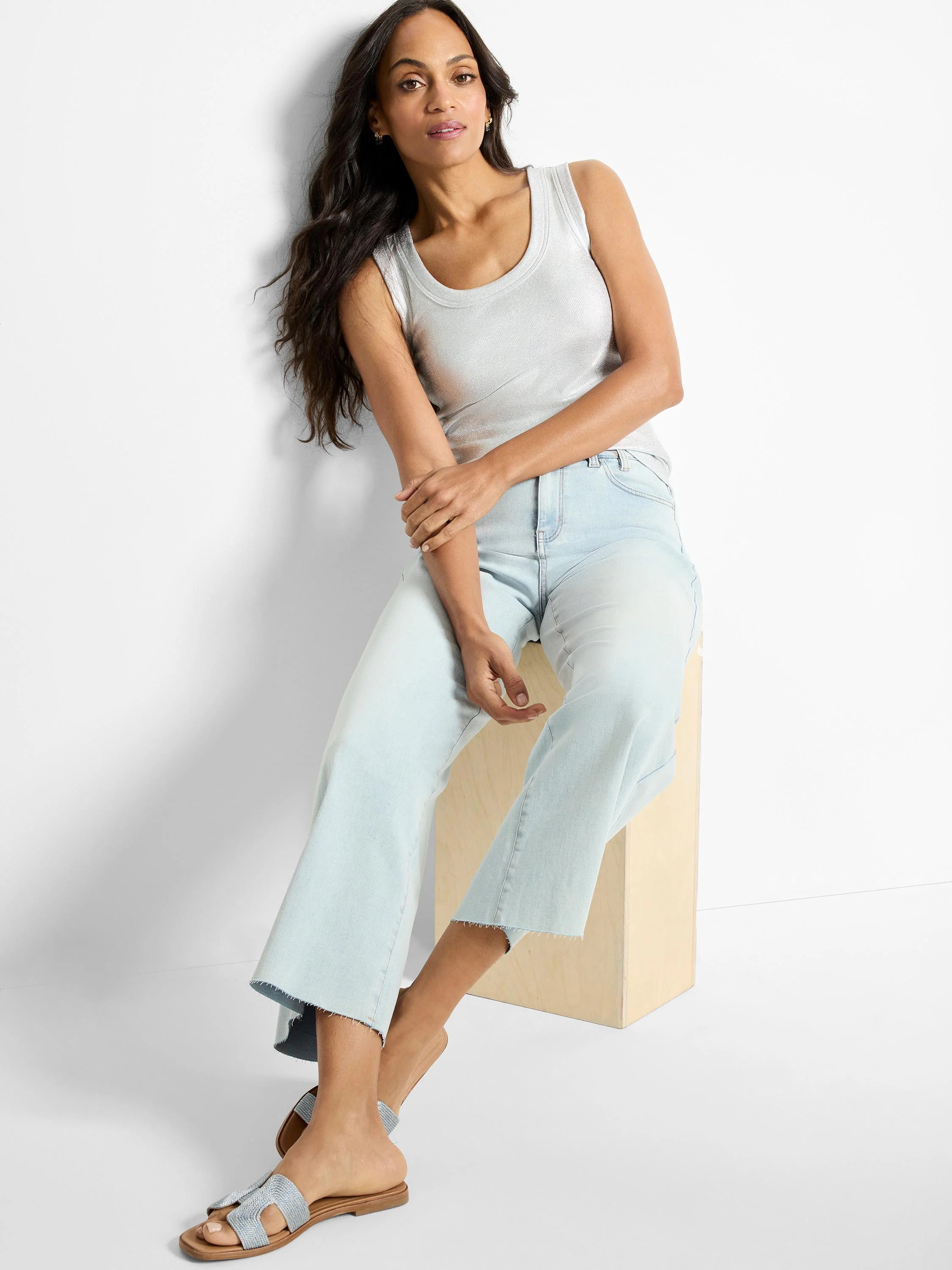 Shimmering silver ribbed tank with scoop neck.