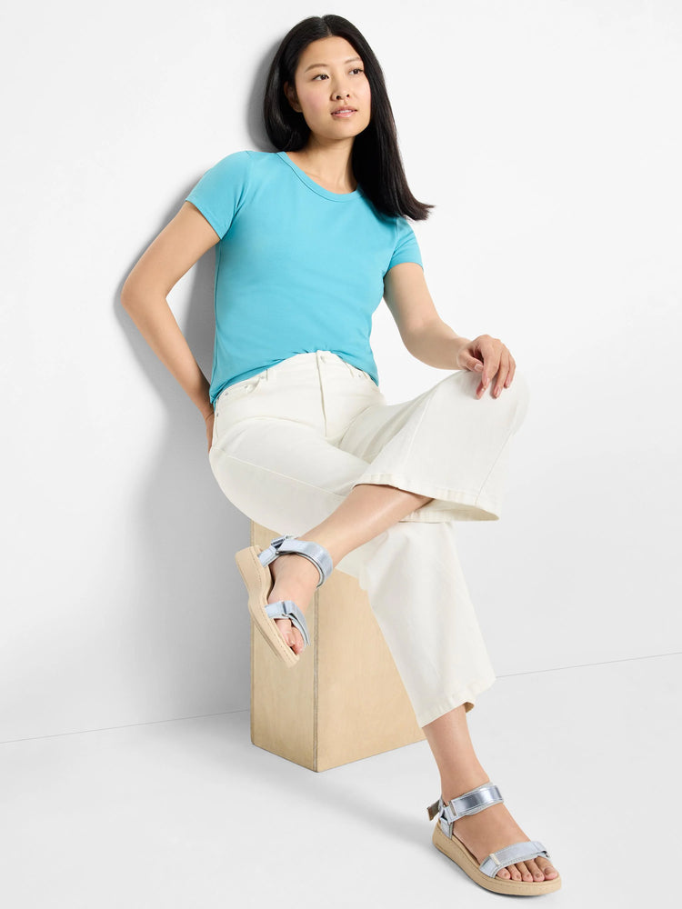 Bright turquoise short-sleeve crew neck t-shirt, smooth knit texture.